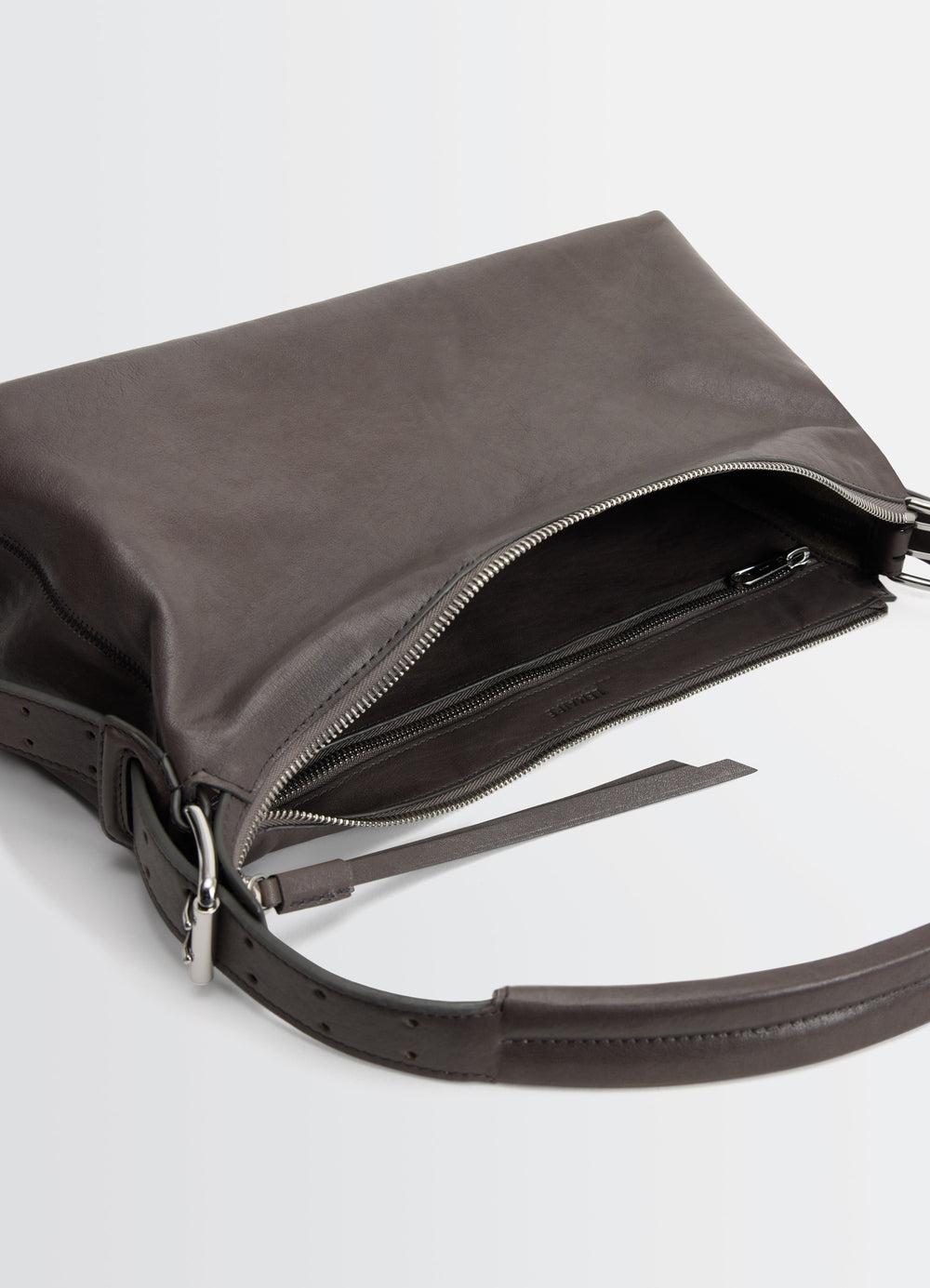 Belted Baguette Bag in Paper Lux Leather, product shot, top open view unzipped with belt detail