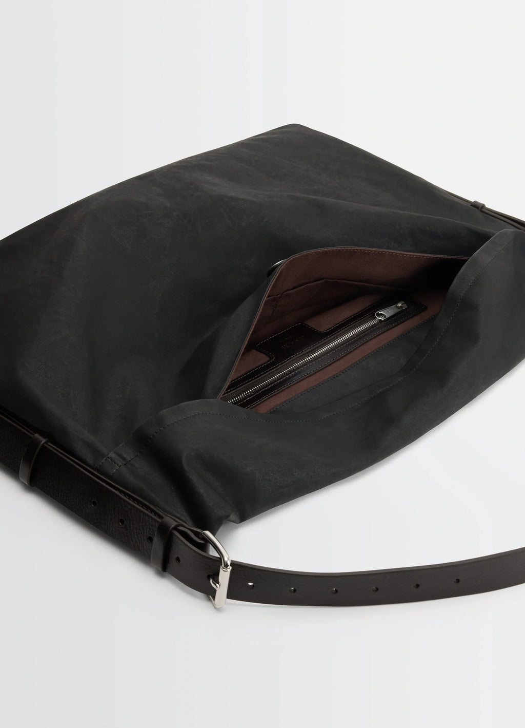Trench Pocket Medium Bag in Black Resinated Cotton Canvas, product shot, top detail view open zipper compartment