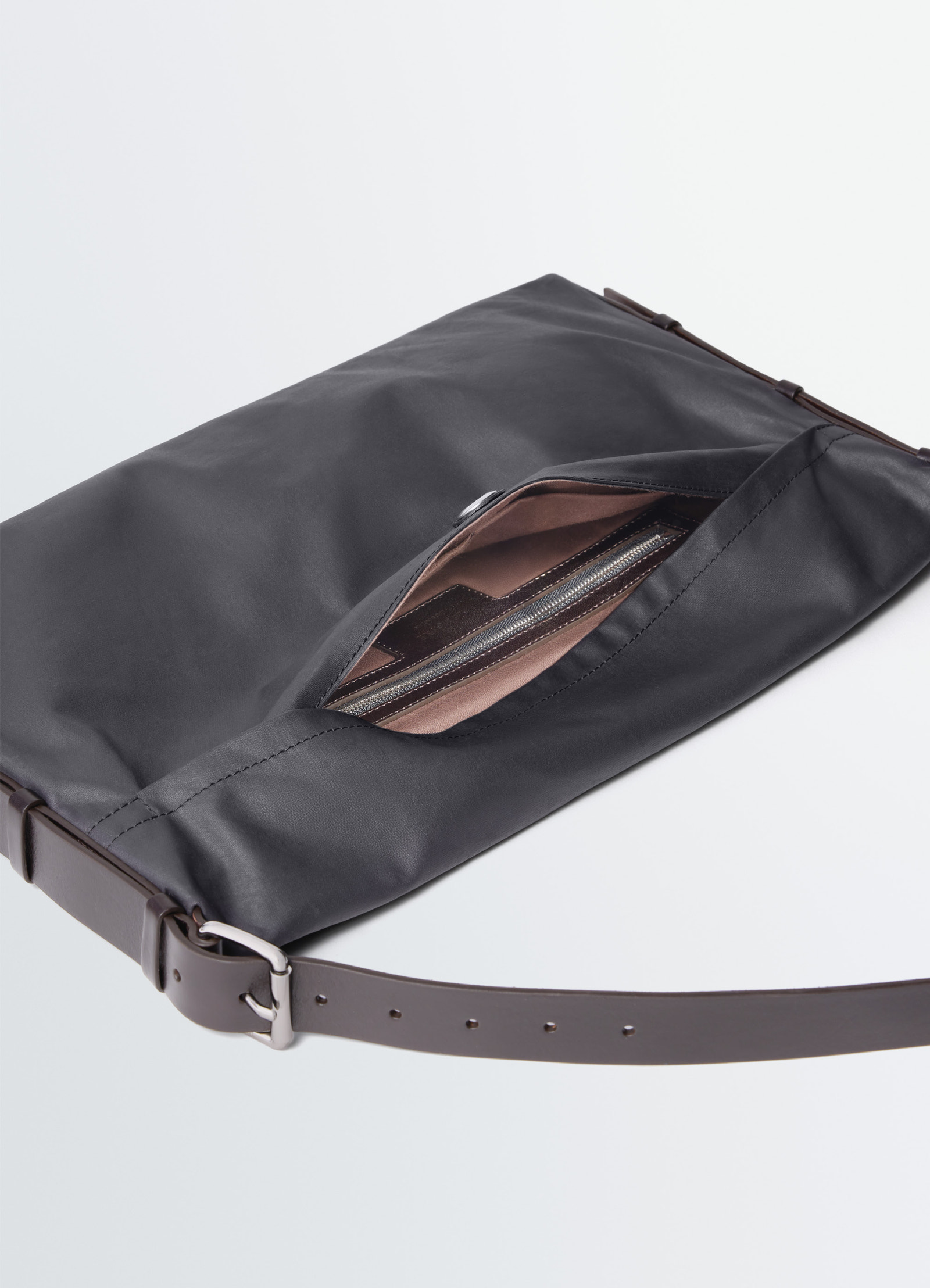 Small trench pocket bag in water-repellant resinated cotton, product shot, top view open zip pocket detail