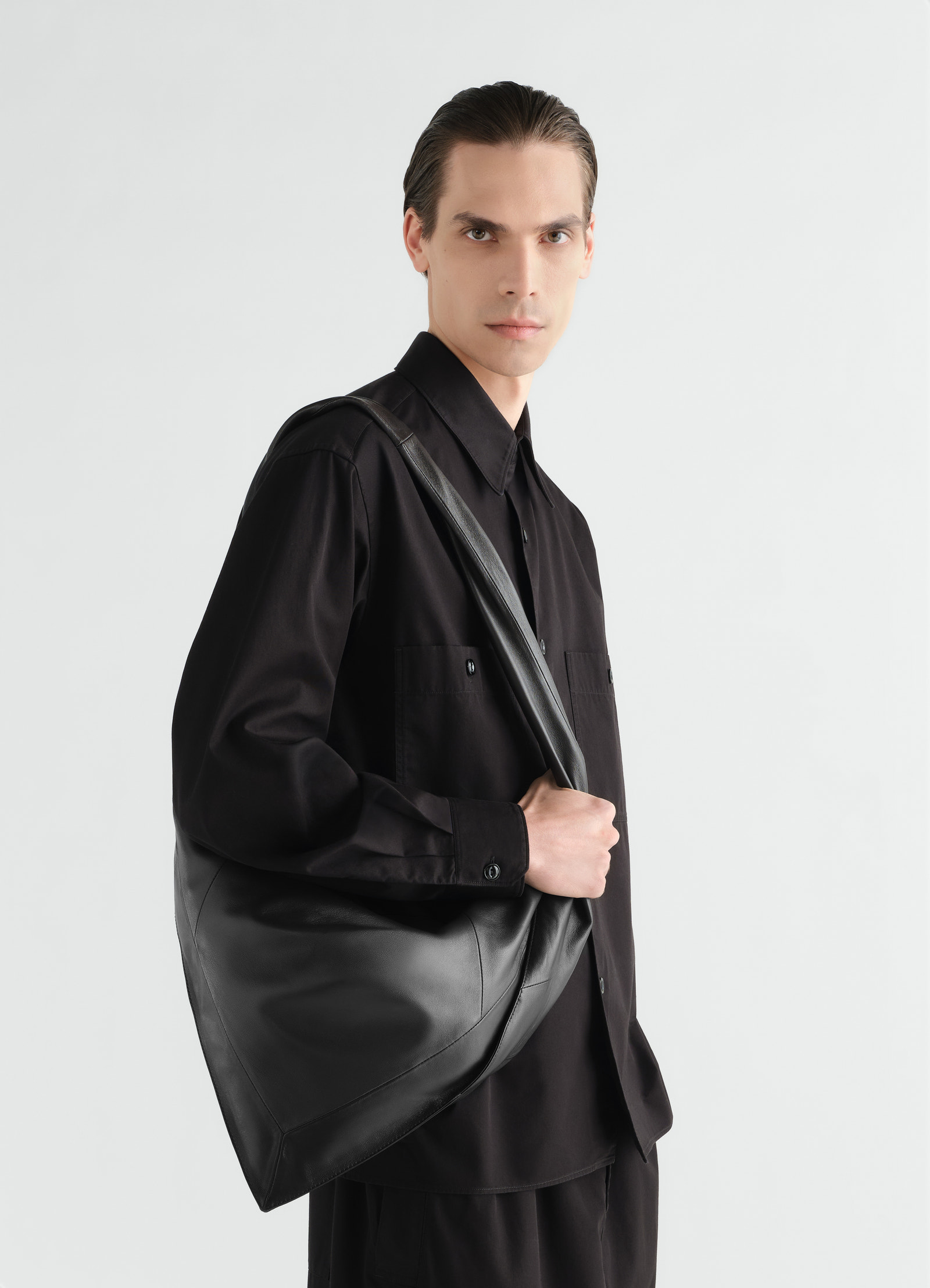 Small scarf extended handle bag in leather
