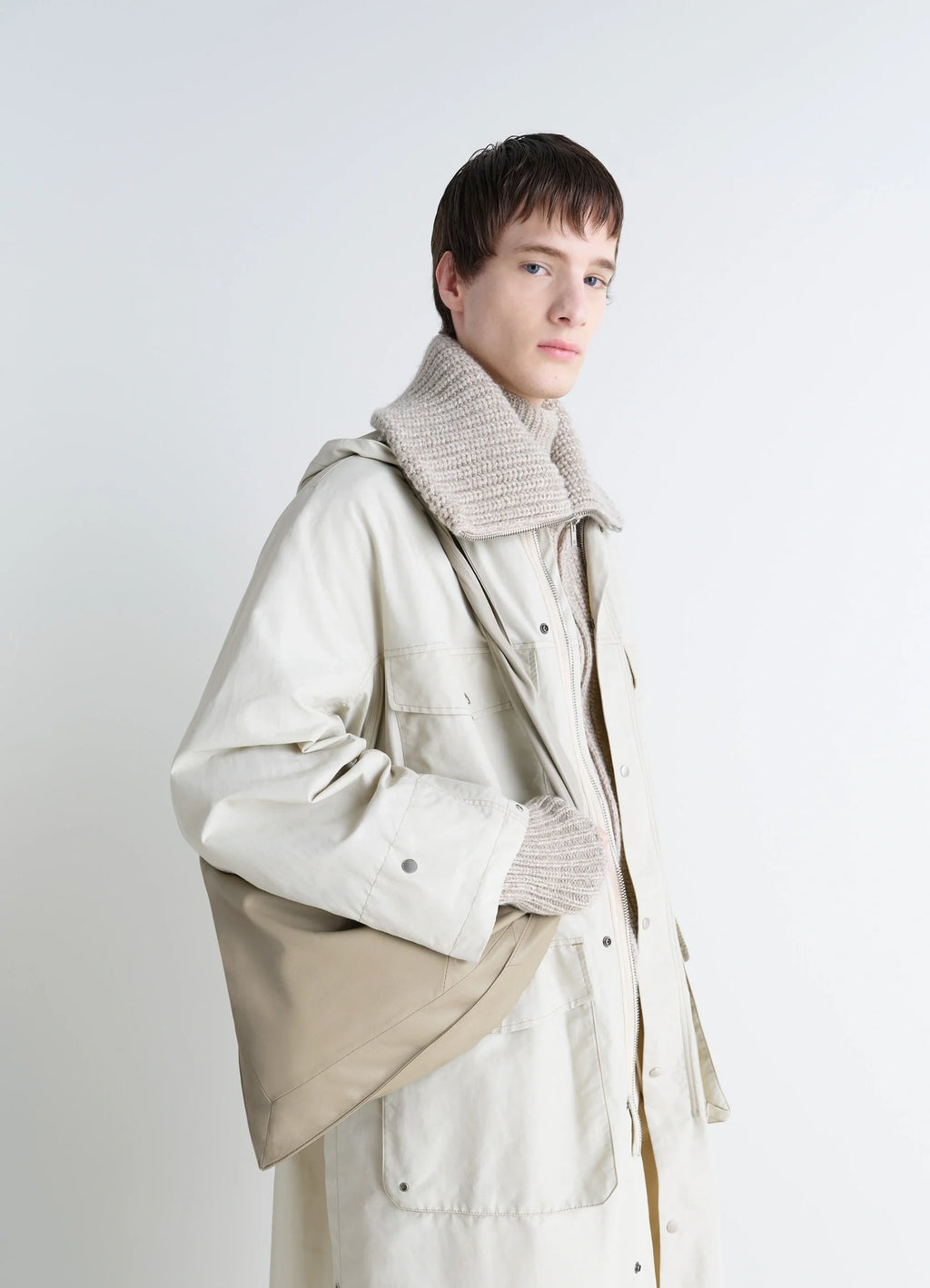 Lemaire Small Scarf Extended Handle in Nappa Leather, model shot, three-quarter view soft shape hanging
