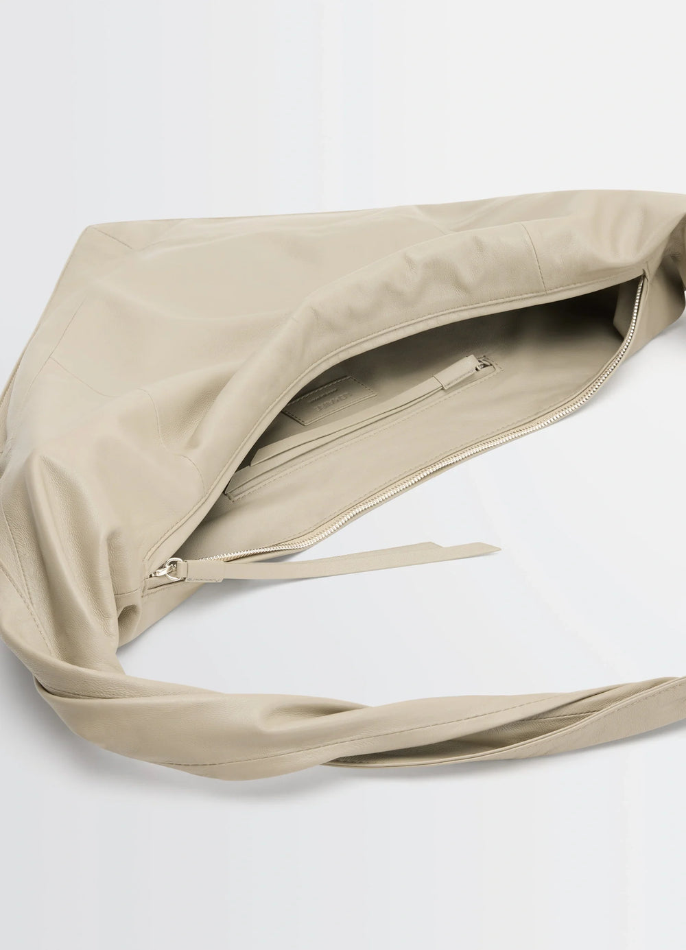 Lemaire Small Scarf Extended Handle in Nappa Leather, product shot, top view exposed zipper detail