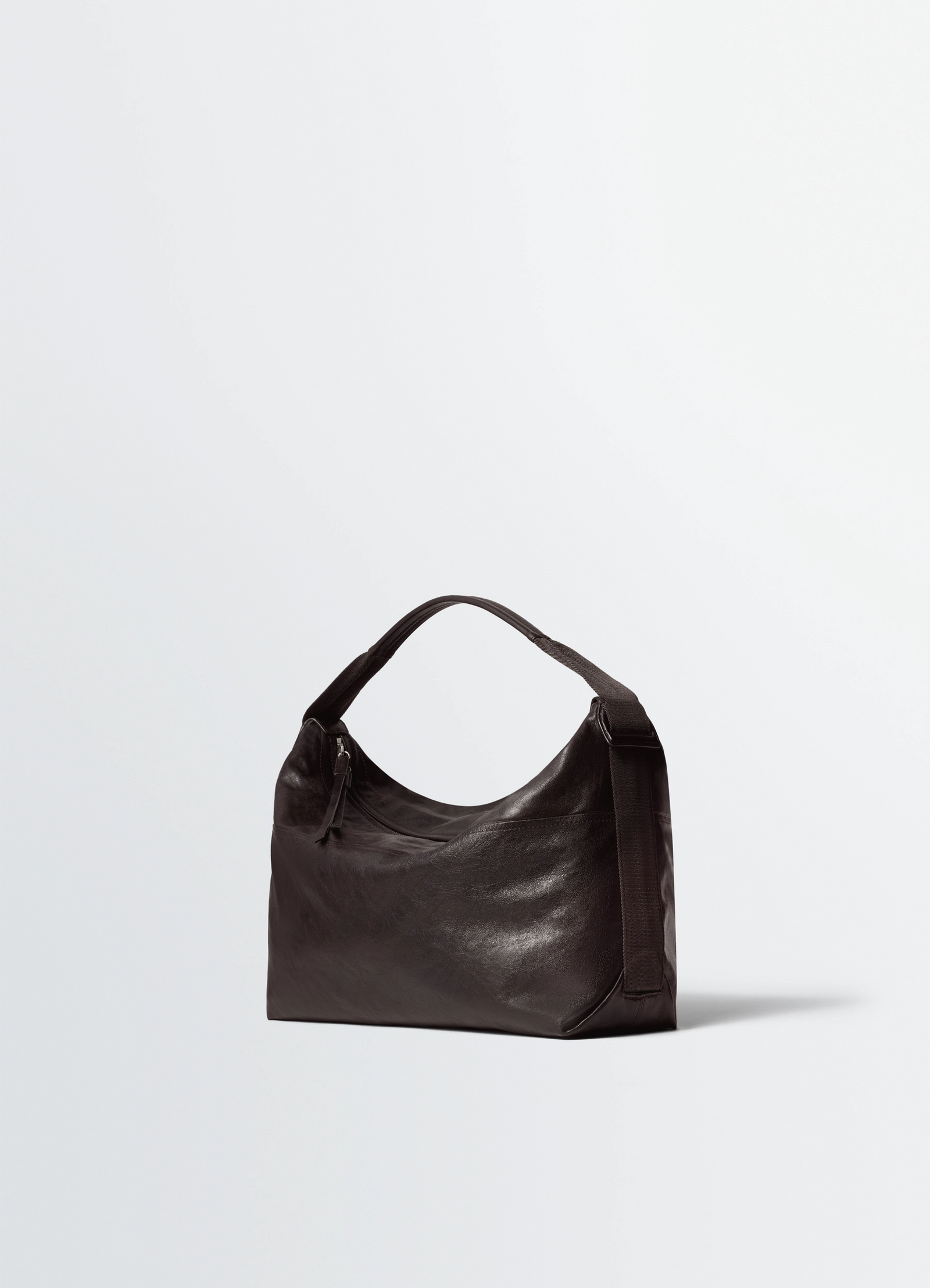 Berlingot hobo bag in leather in glazed paper, product shot, left side view textured with zipper detail