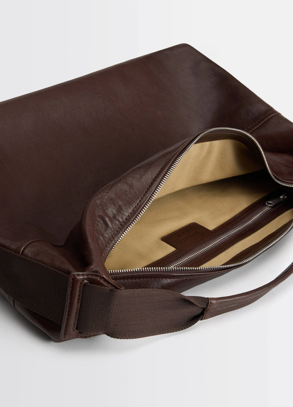 Berlingot Hobo Bag in Glazed Paper Leather, product shot, top interior view zippered pocket detail