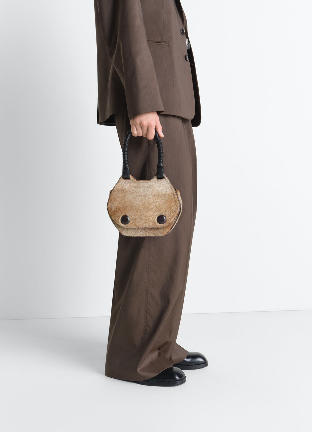 Frog Handbag in Pony-effect Leather, model shot, side view held by model