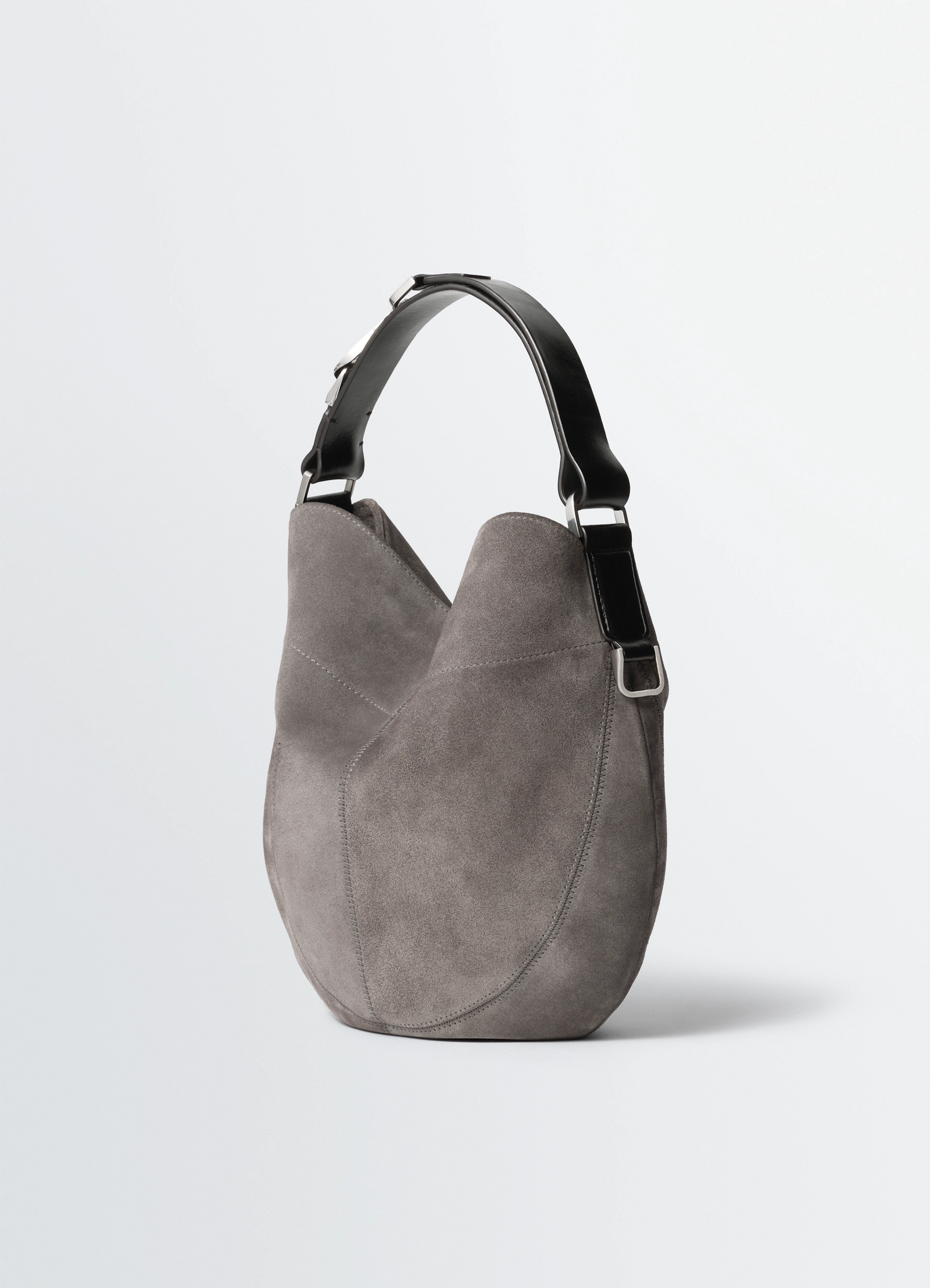 Hobo quiver clip bag in suede leather, product shot, three-quarter view contrast black strap