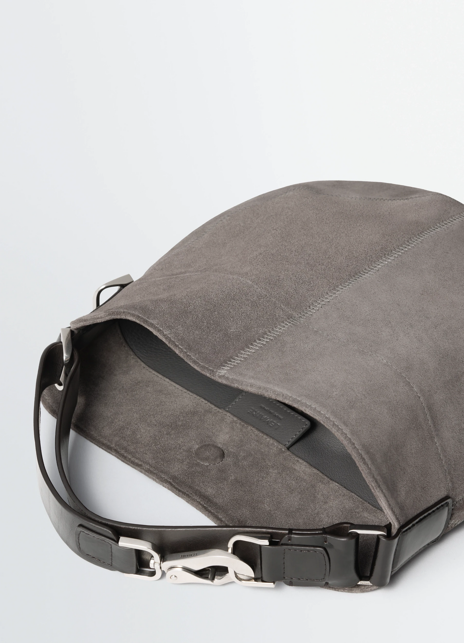 Hobo quiver clip bag in suede leather, product shot, detail shot top angle visible clip closure