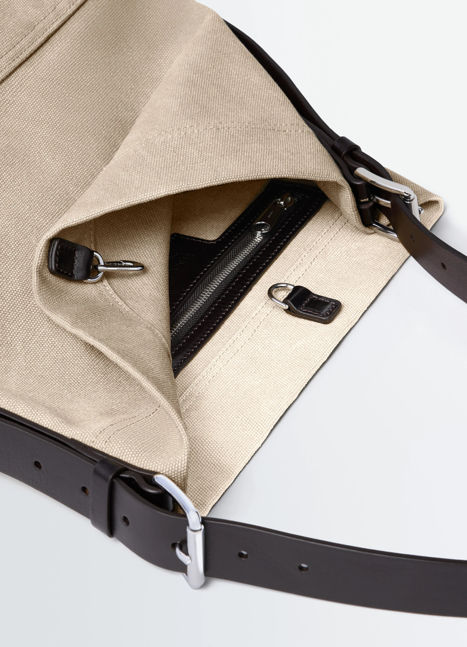 Small belted tote bag in tie-dye cotton canvas, product shot, open top detail shot revealed interior zip