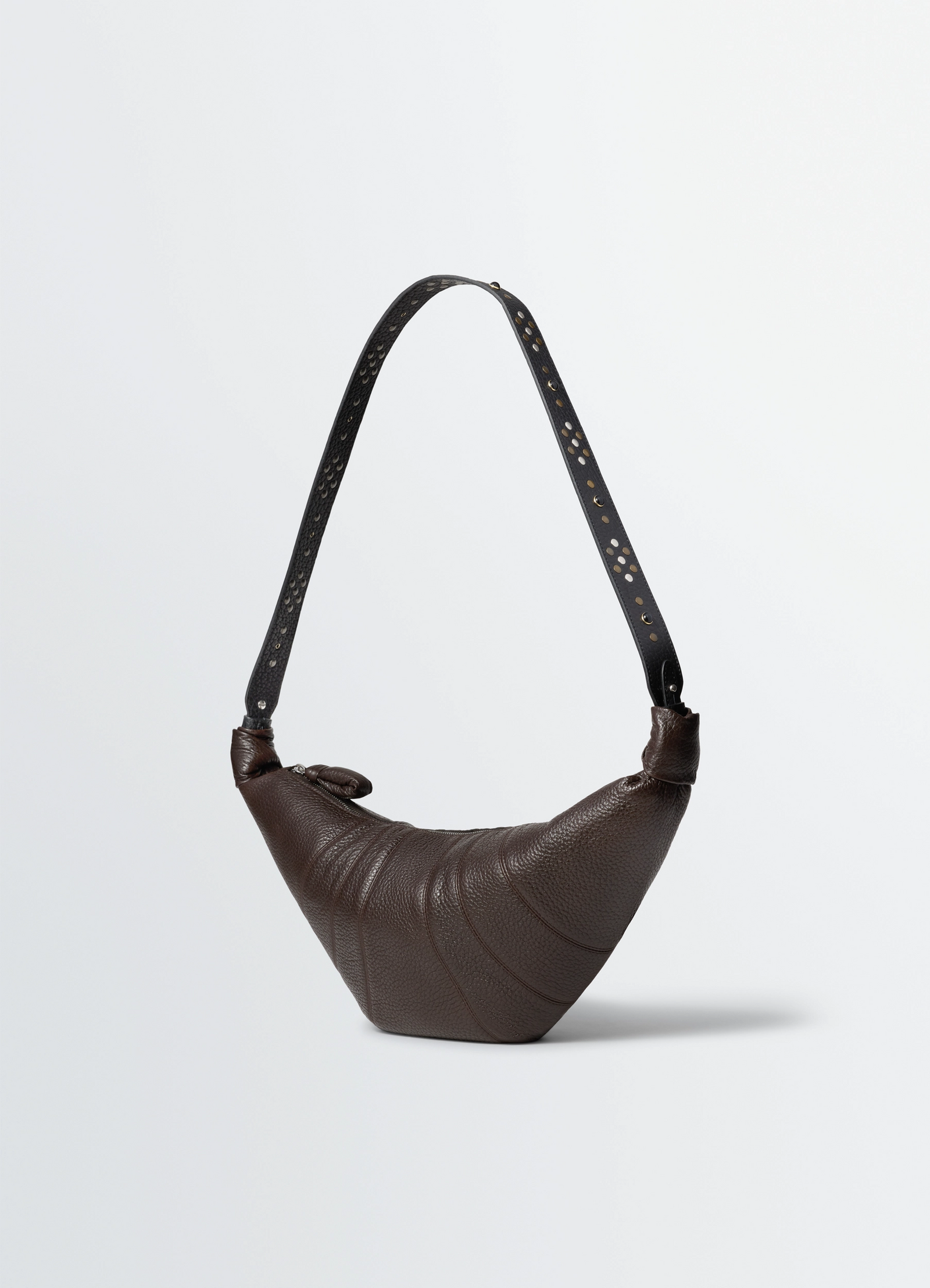 Western studs medium croissant bag in grained leather, product shot, side view accentuated texture with studs