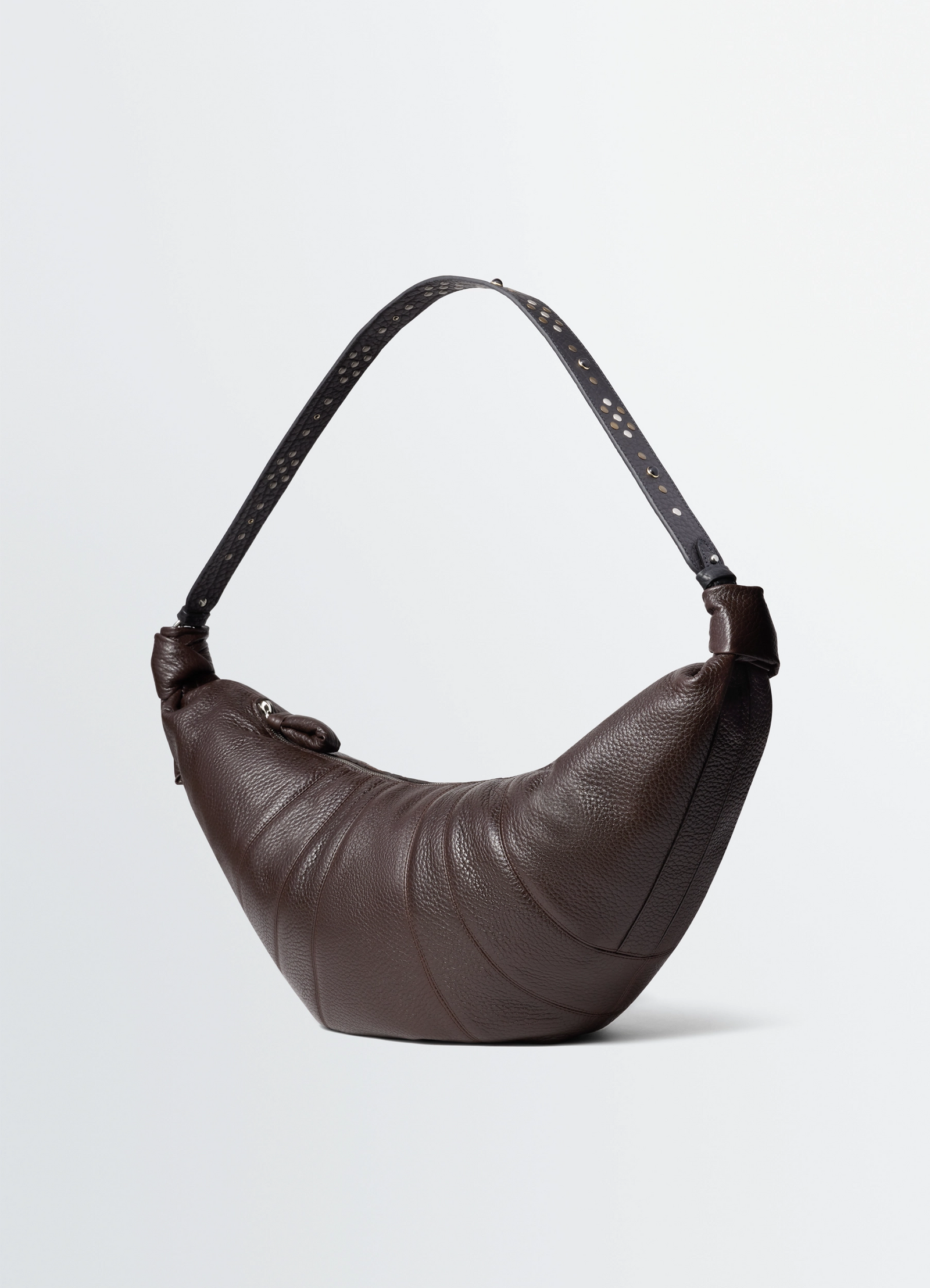 Western studs large croissant bag in leather, product shot, back view curved silhouette