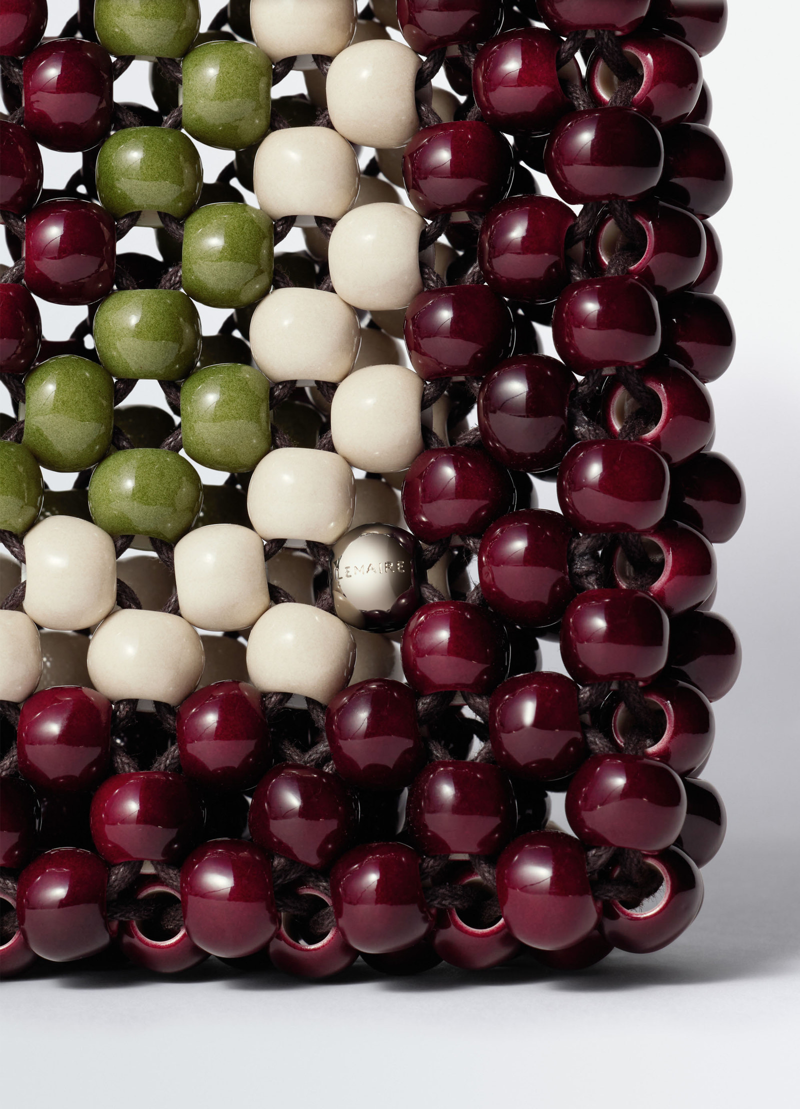 Taxi small bag in plexiglass beads, product shot, close-up detail colorful bead texture