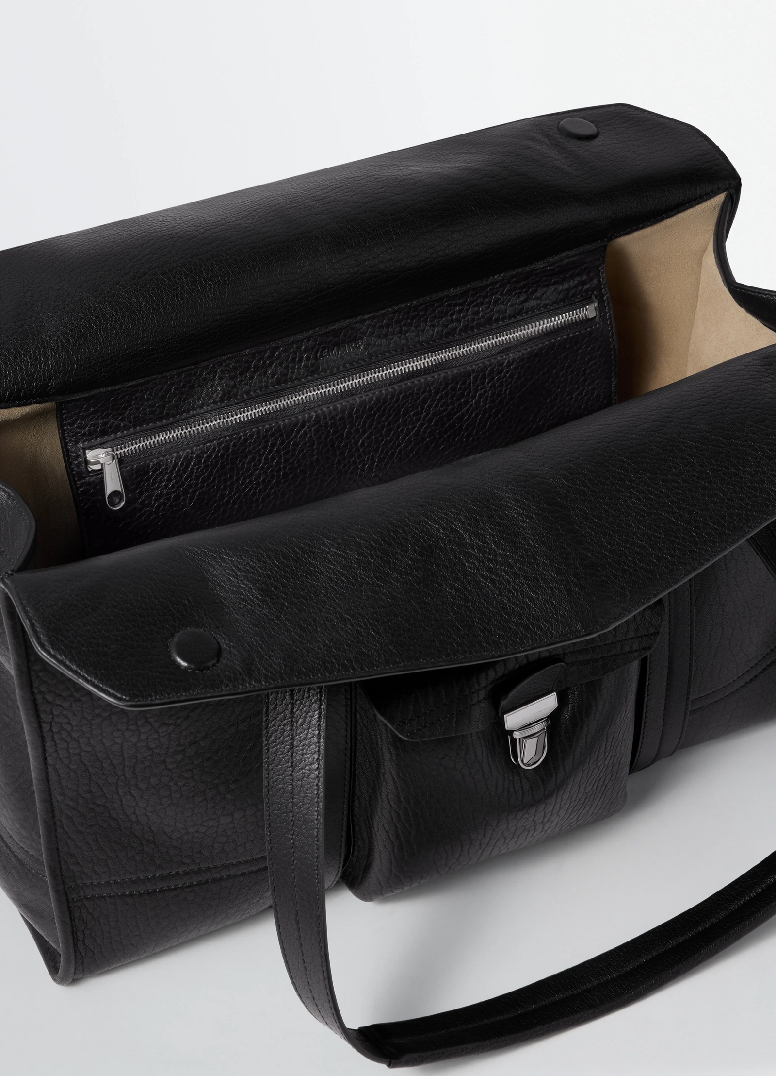 Lemaire soft gear tote bag in black bubble leather, product shot, top interior view zip pocket detail