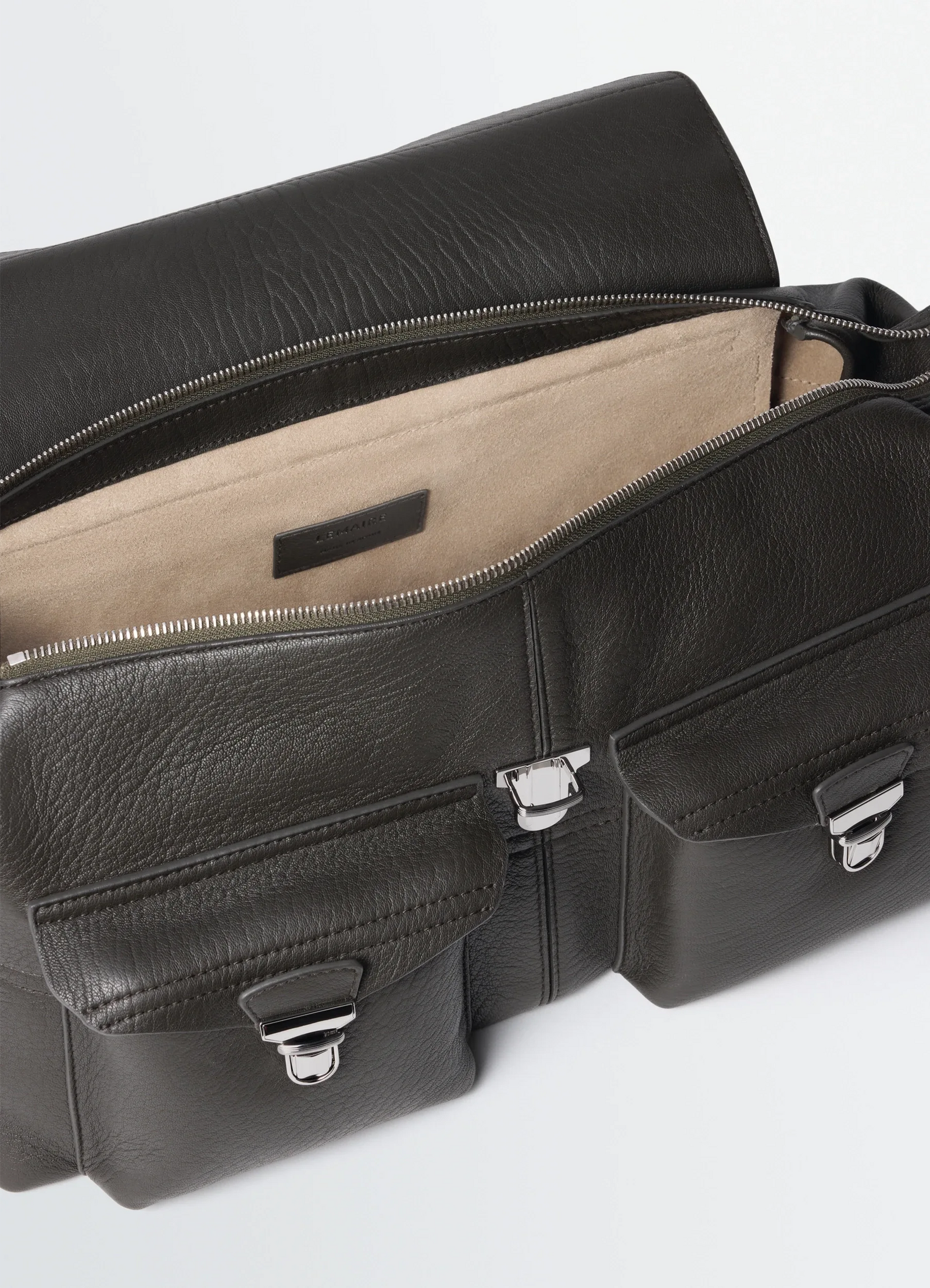 Lemaire soft gear bag in bubble lamb leather, product shot, top interior view open zipper detail