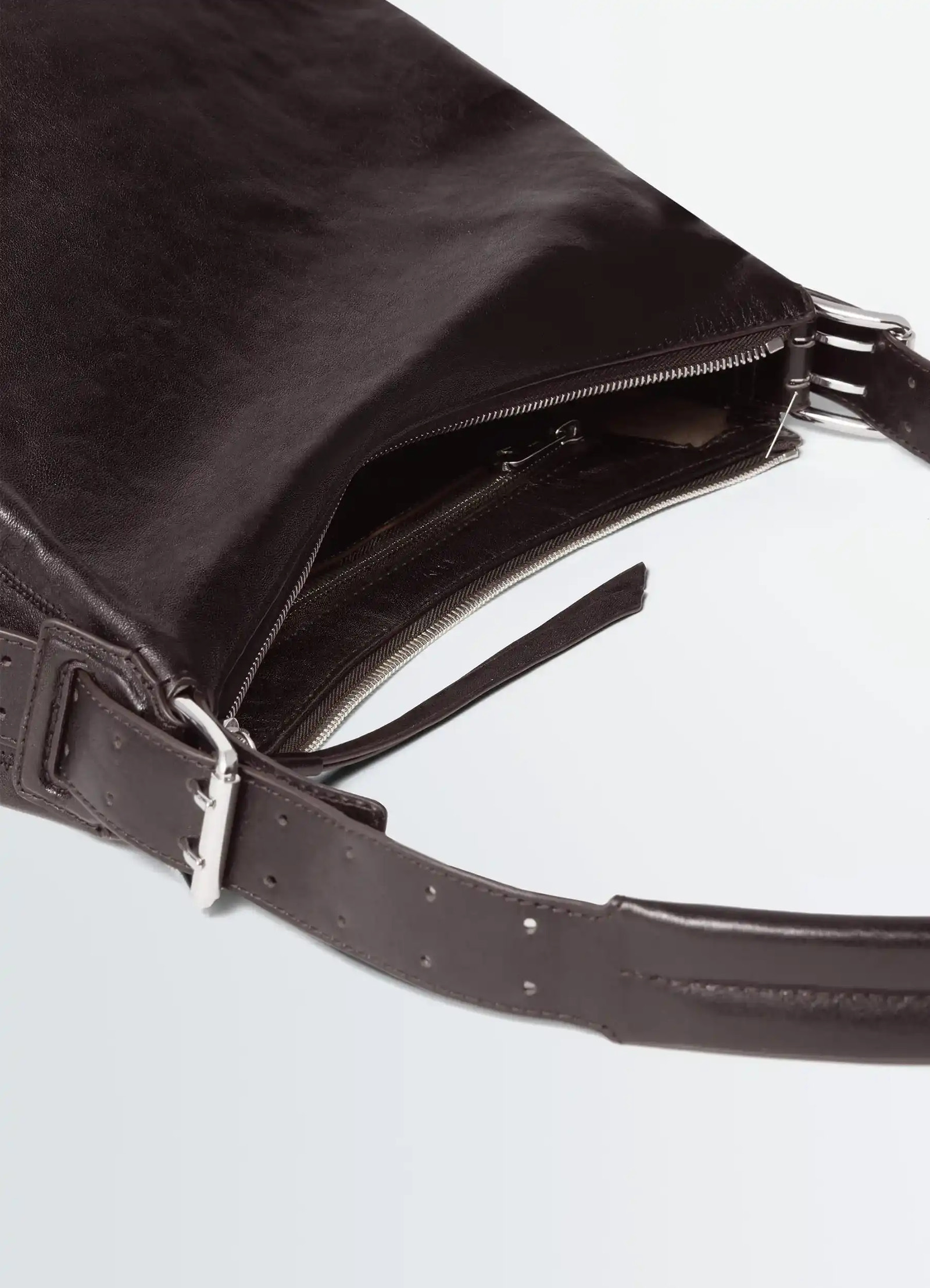 Small belted hobo bag in leather, product shot, top detail shot interior zipper compartment
