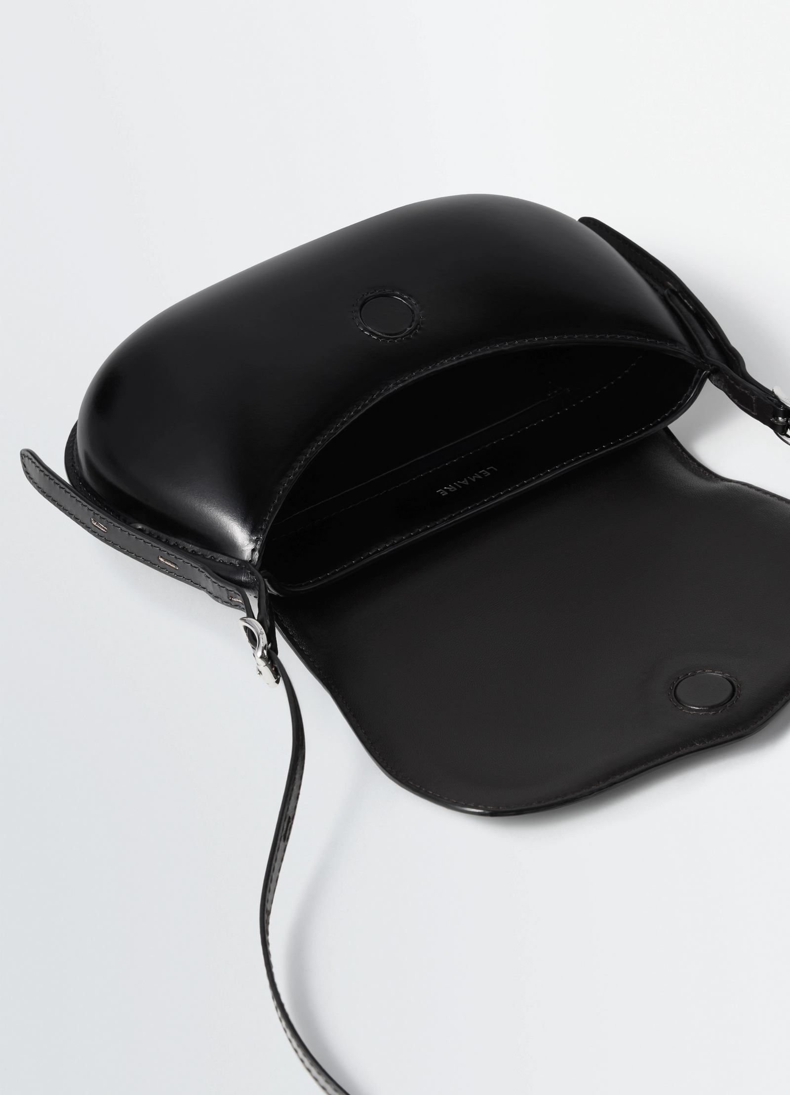Lemaire belly bag in silver lwg-certified leather, product shot, top open view molded leather flap