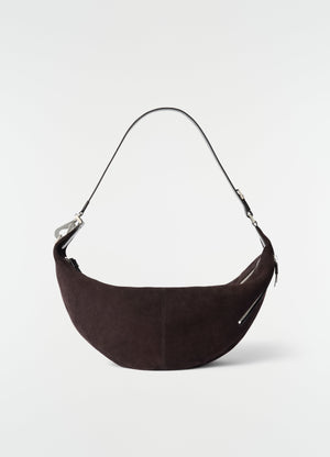Quiver clip bag in dark brown suede leather with silver zippers and black strap by lemaire on white background