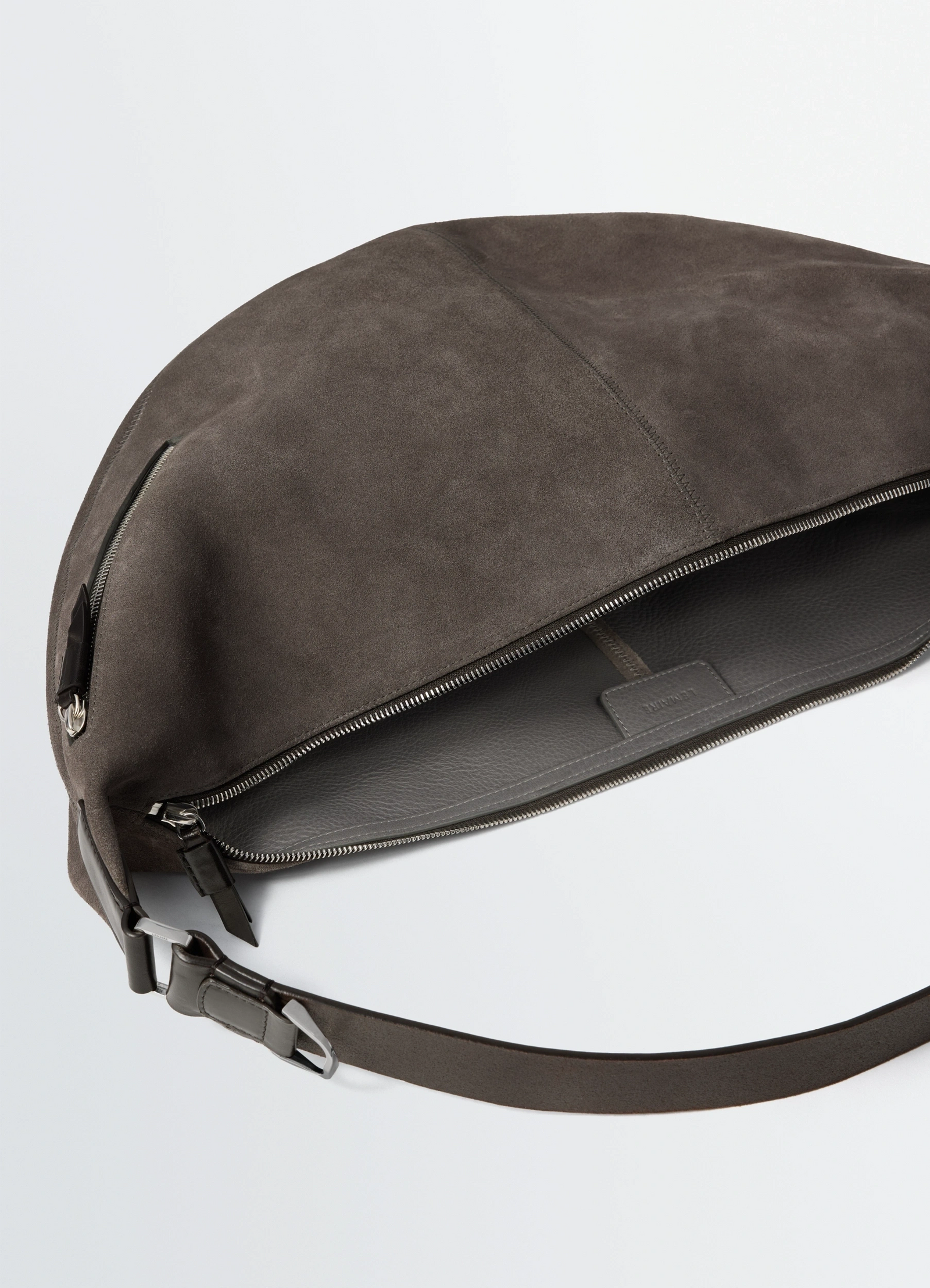 Quiver clip bag in grey suede and leather, product shot, angled top detail dual zipper open view