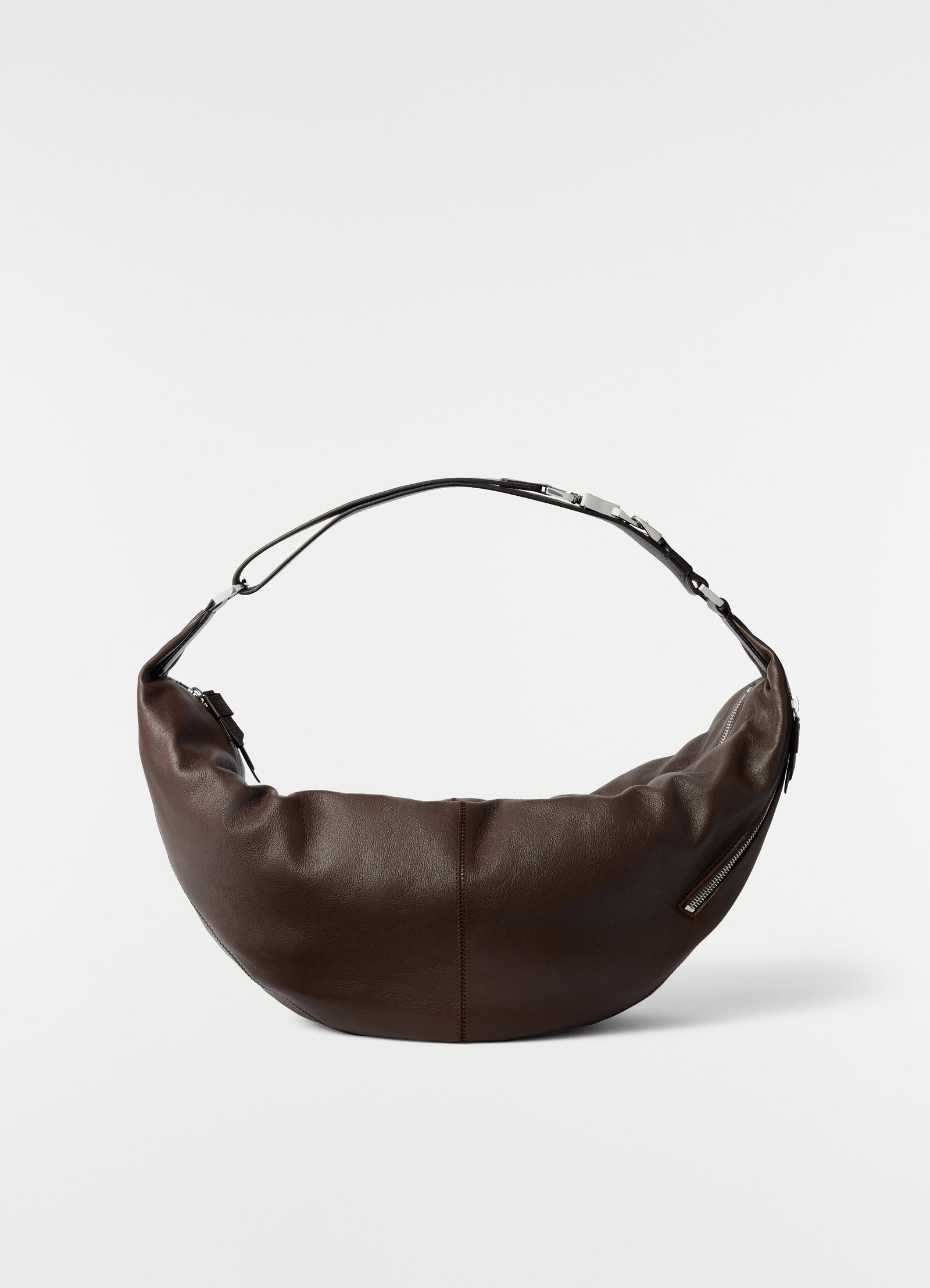 Quiver clip bag in dark brown leather with silver hardware by lemaire on plain white background