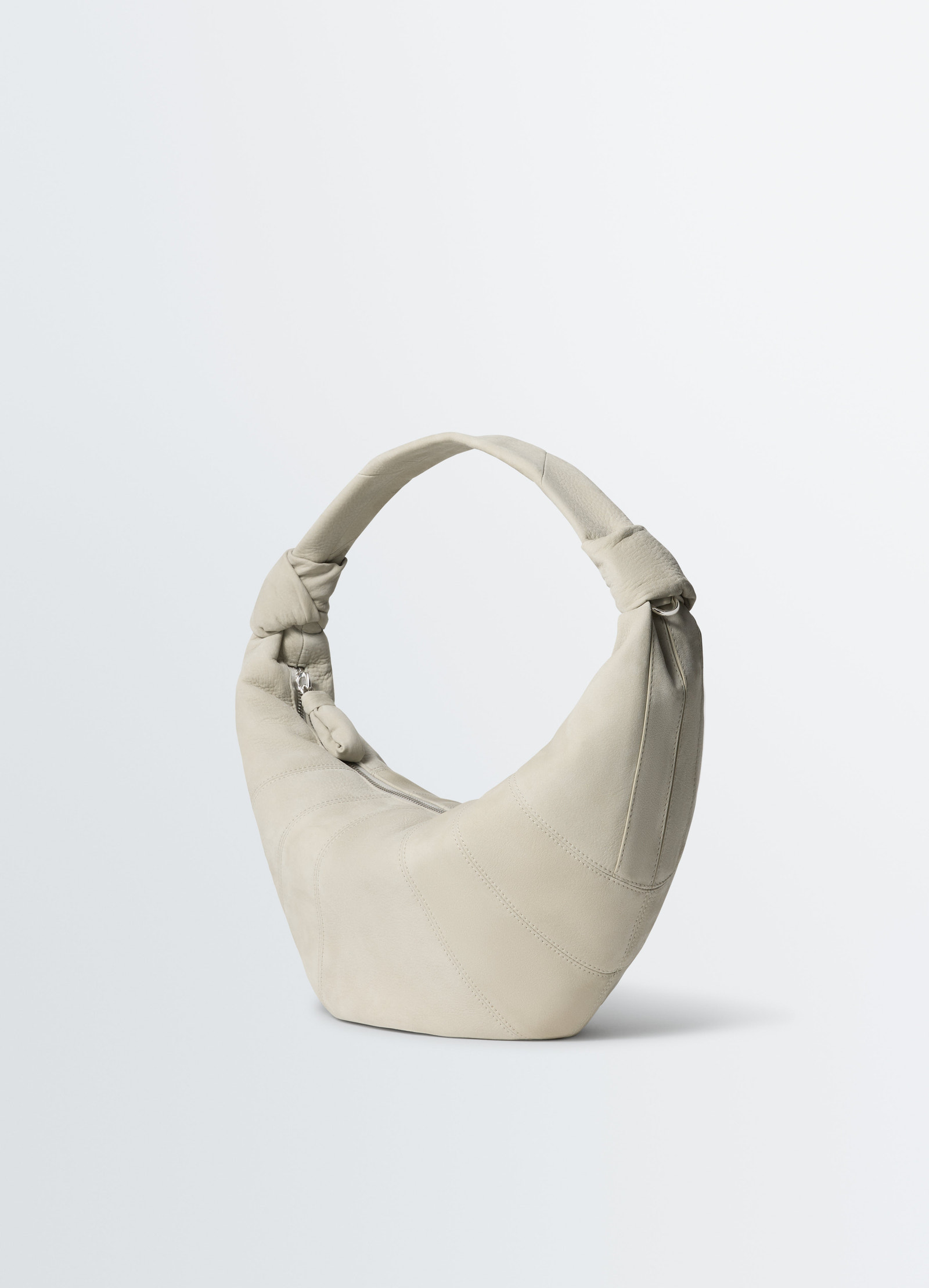 Fortune croissant bag by lemaire in beige alpaca nubuck with knotted handle detail front view on white background