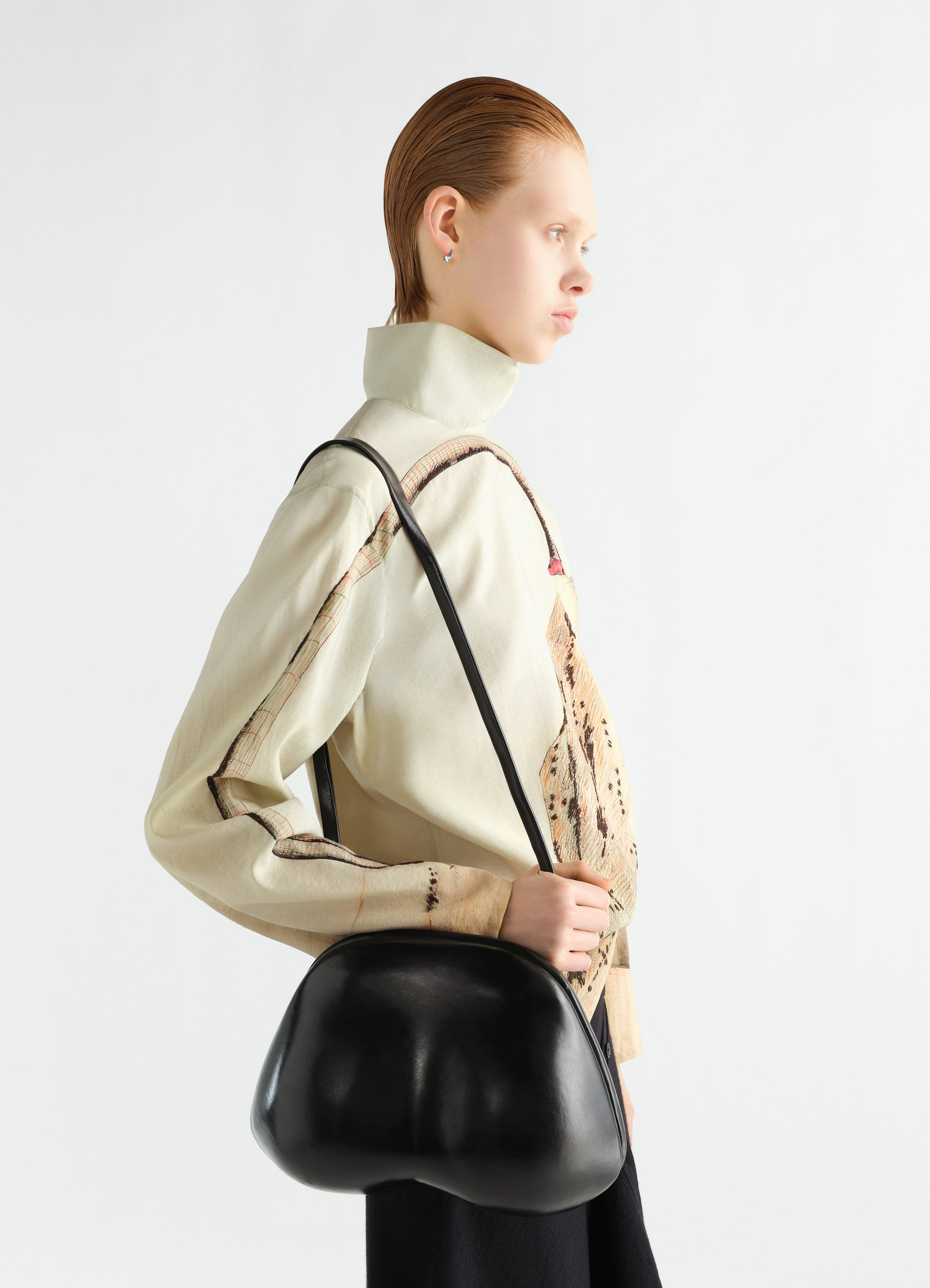 Fesses bag in patinated leather