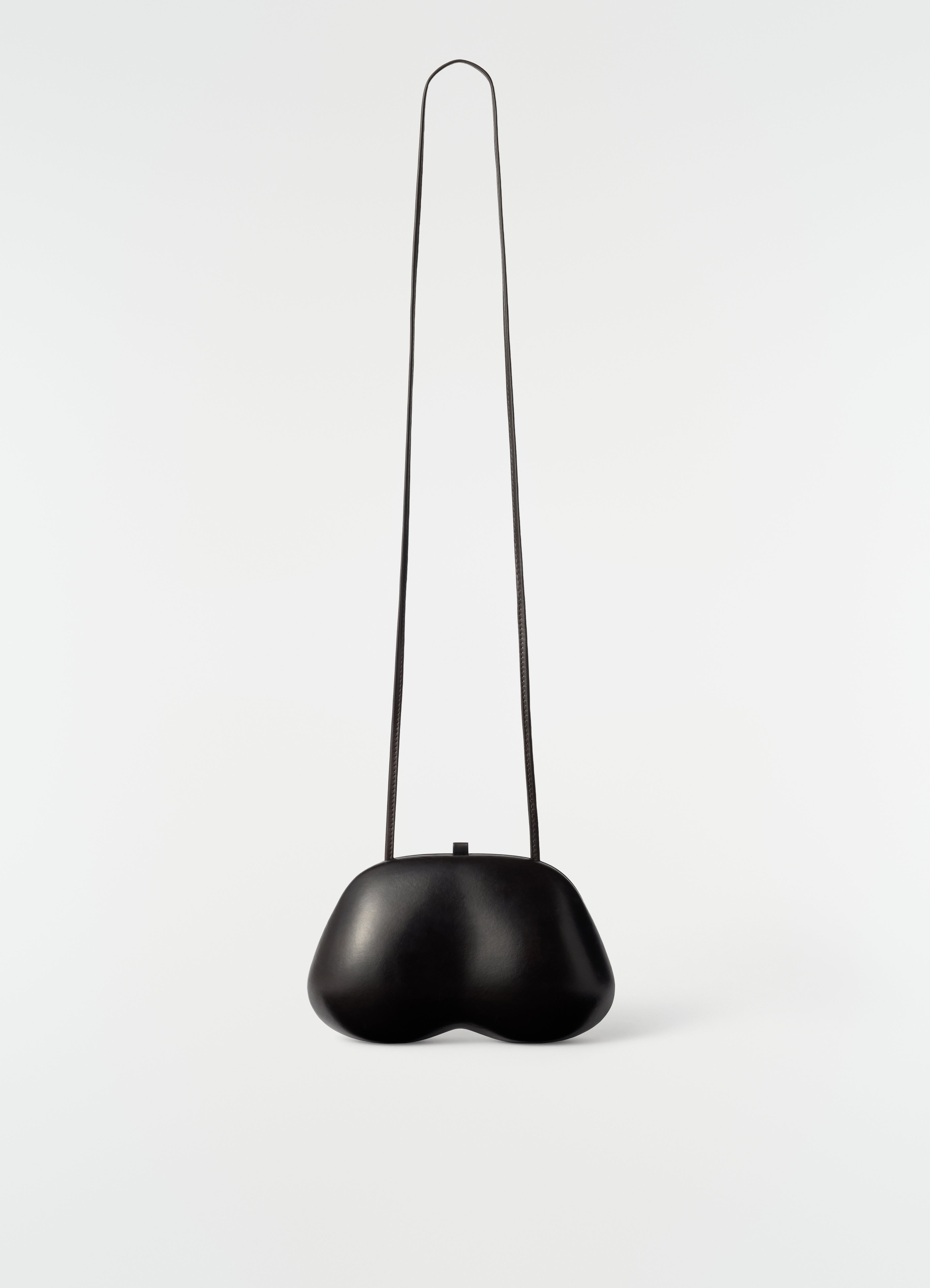 FESSES CLUTCH IN PATINATED CALFSKIN