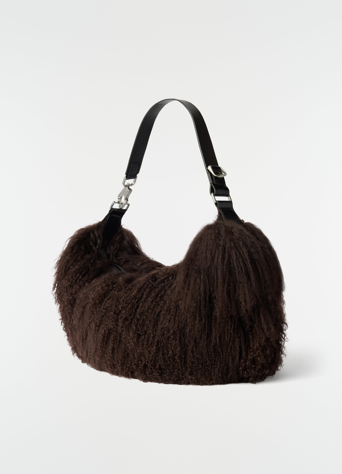 Quiver clip bag in dark brown mongolian lambskin with black strap by lemaire front view on white background