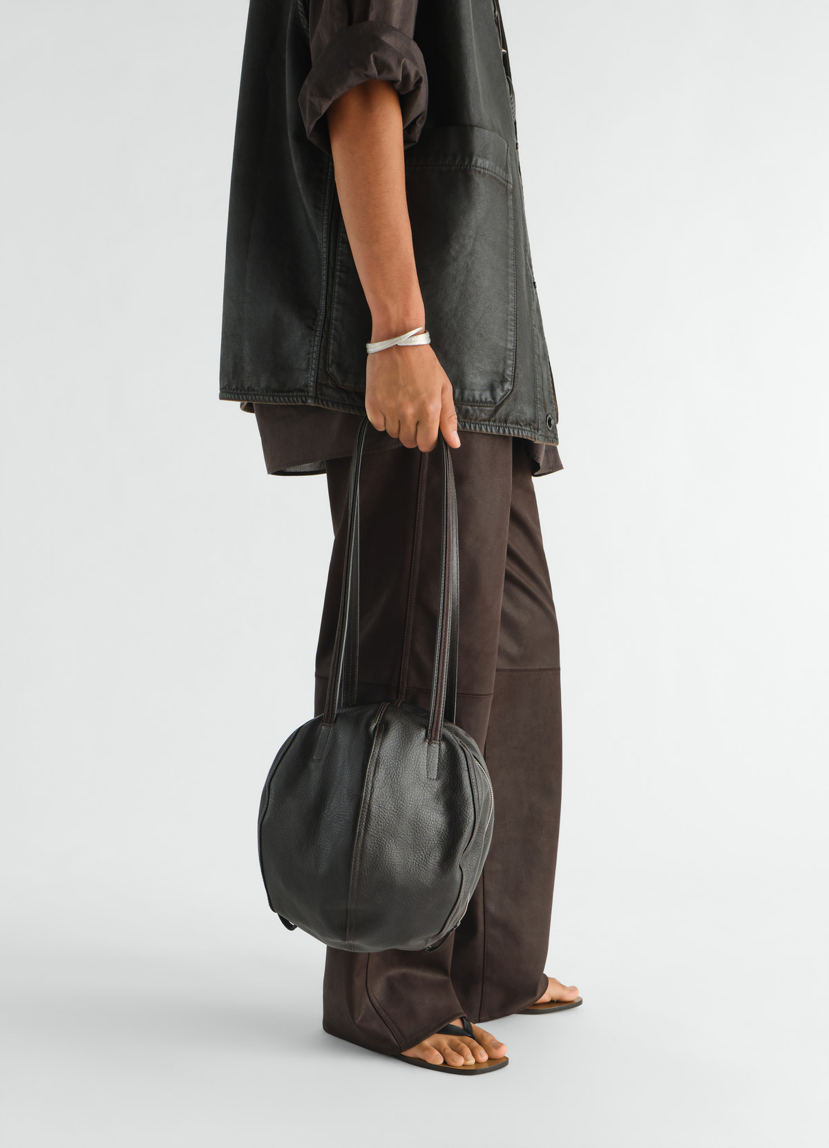 Small helmet hobo bag in grained paper lux leather
