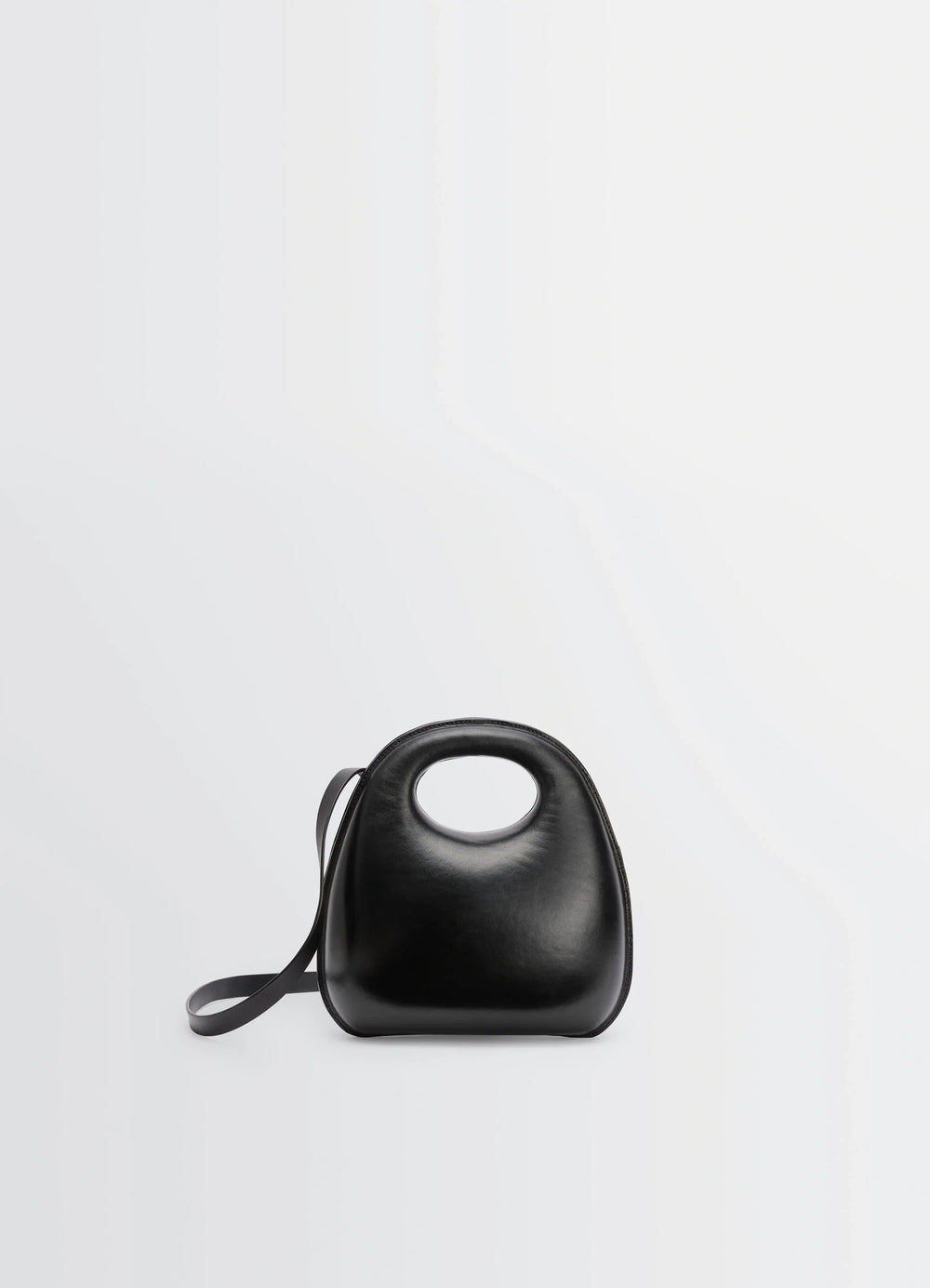 Lemaire Egg Bag in Black Patinated Leather, product shot, front view molded leather structure