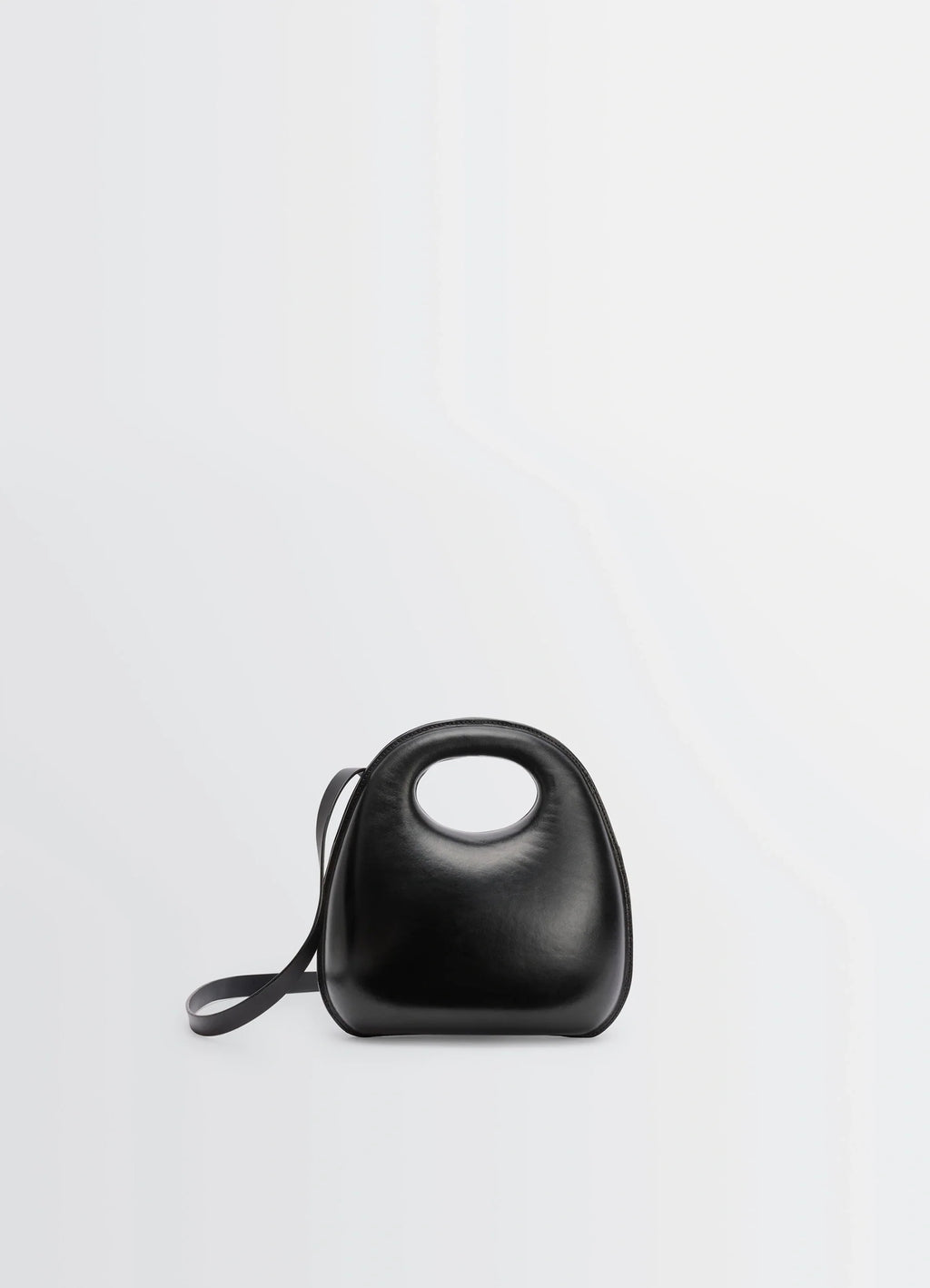 Lemaire Egg Bag in Black Patinated Leather, product shot, front view molded leather structure
