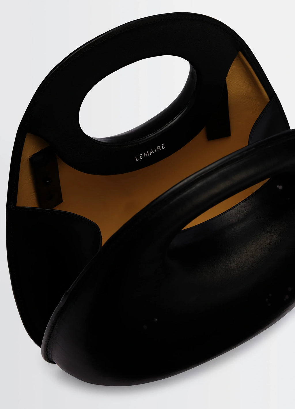 Lemaire Egg Bag in Black Patinated Leather, product shot, top view open interior detail