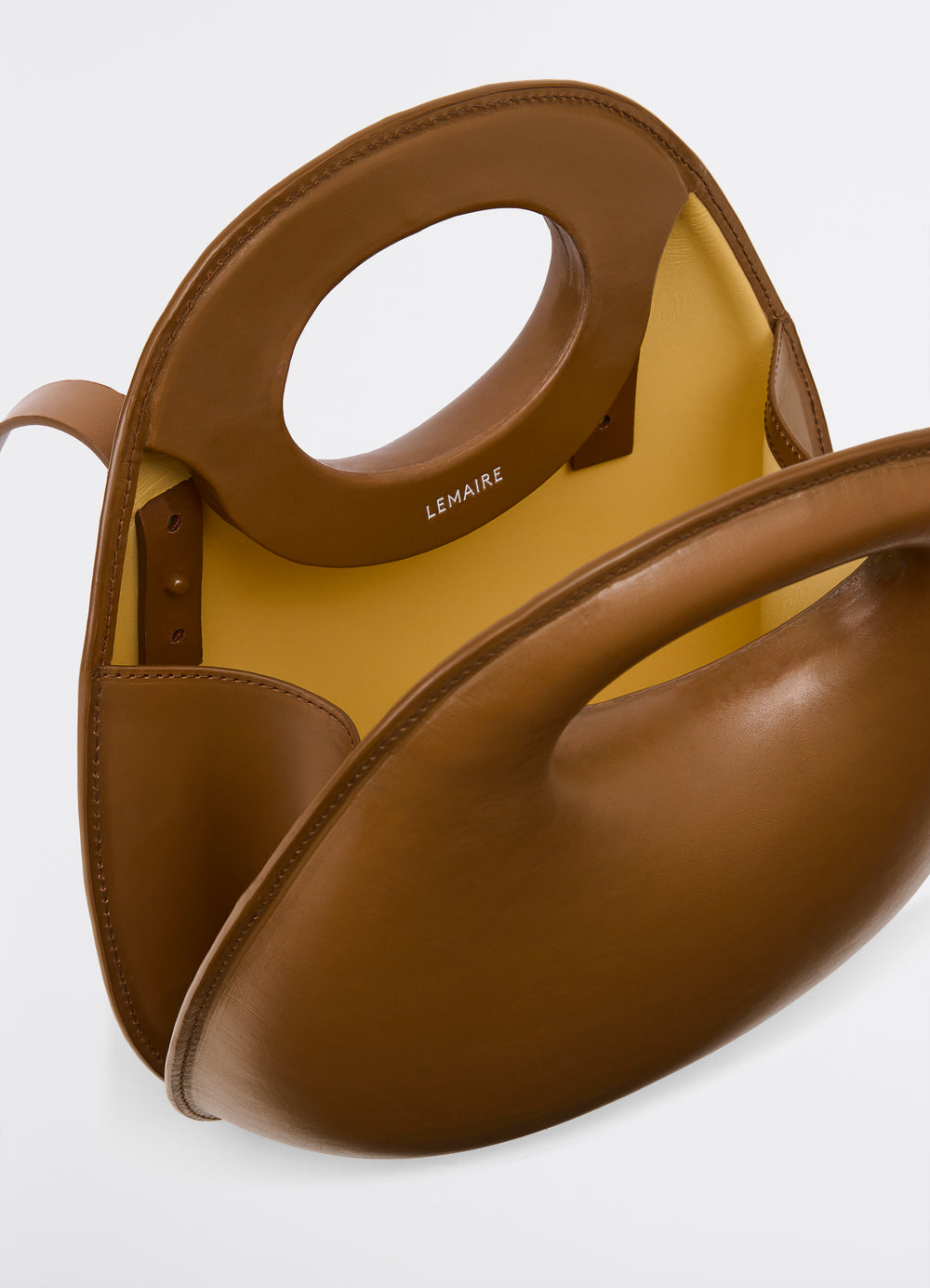 Lemaire Egg Bag in Smooth Vegetable-Tanned Cowhide, product shot, top interior view cut-out handle opening