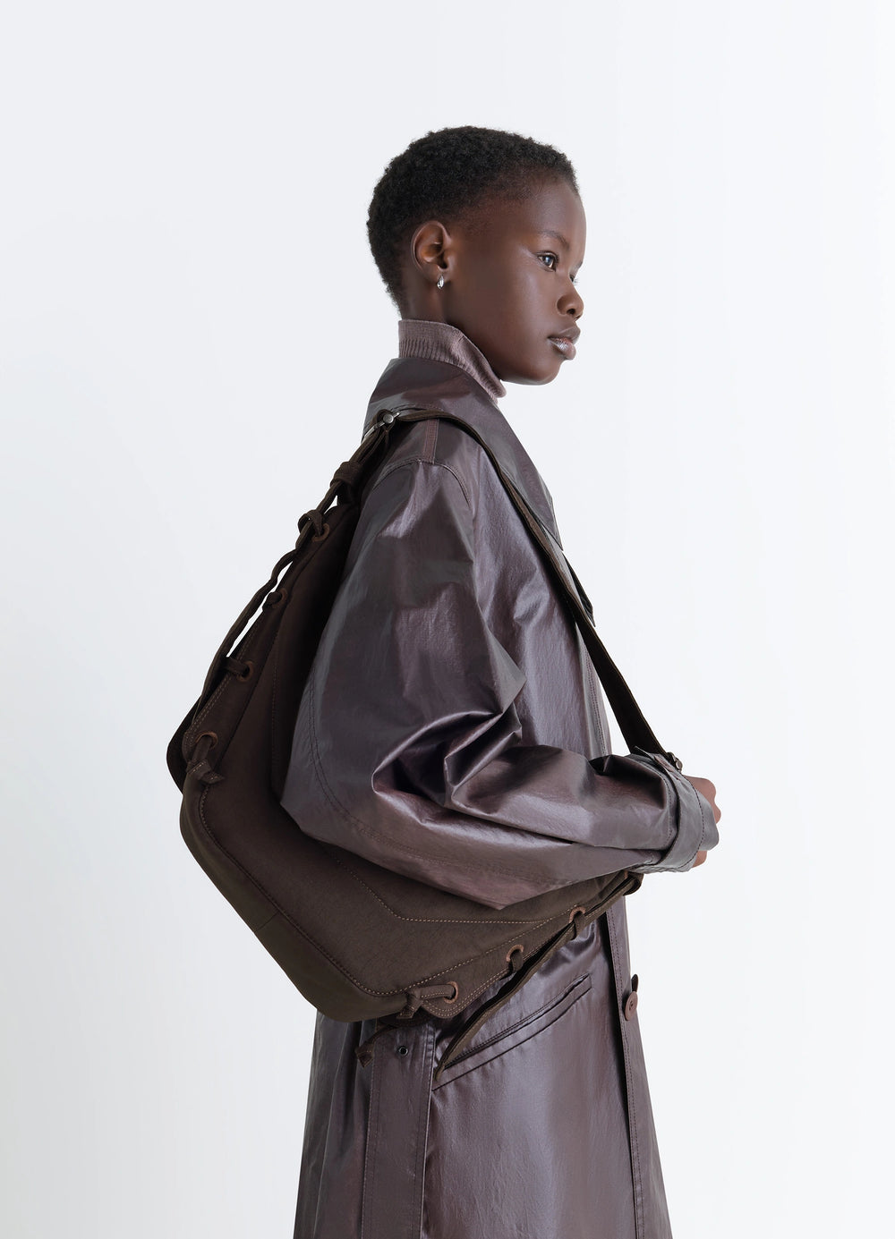 Small Soft Game Bag in quilted water-repellent nylon, model shot, side view crossbody worn