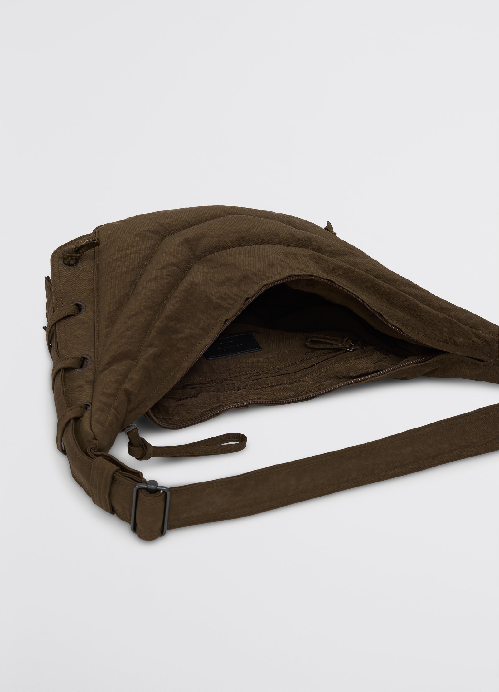 Small soft game bag in fluffy nylon canvas, product shot, top open view adjustable strap