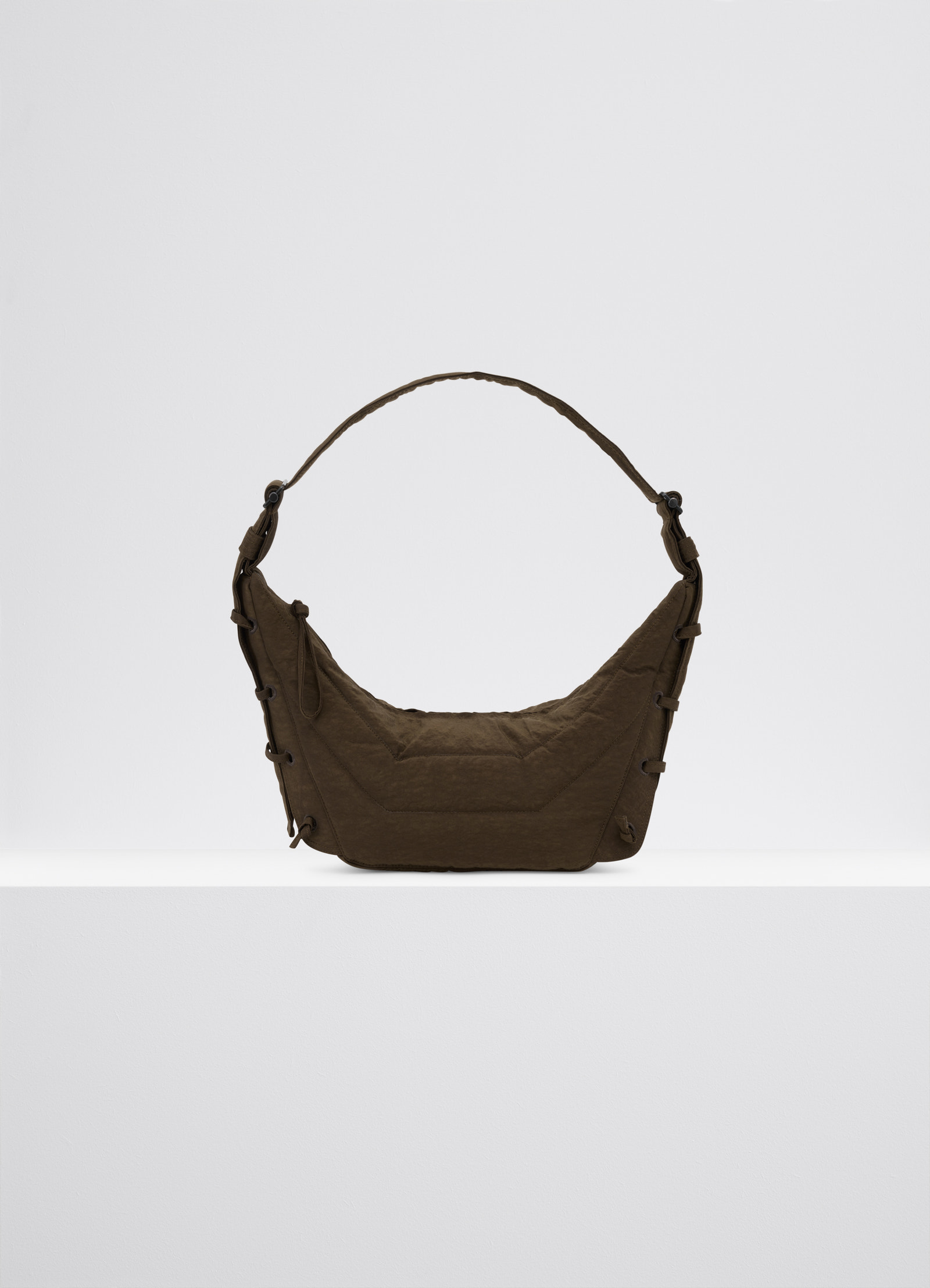 Small soft game bag in fluffy nylon canvas, product shot, front view matte surface sturdy structure