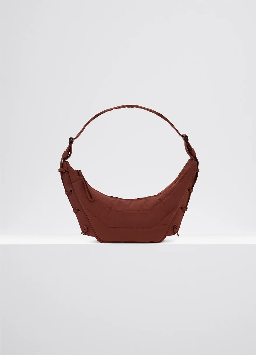 Small soft game bag in fluffy-nylon canvas, product shot, front view matte surface sturdy