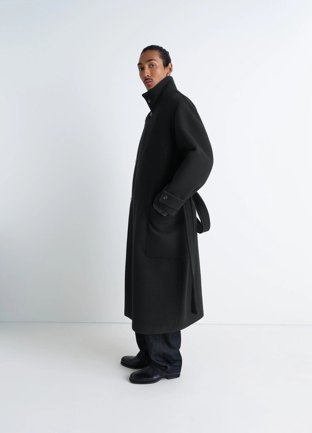 Lemaire Wrap Coat in Black Double-Faced Wool, model shot, side profile view high collar unisex fit