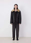 Lemaire Shearling Coat in Heavy Lamb Shearling, model shot, front view boxy silhouette