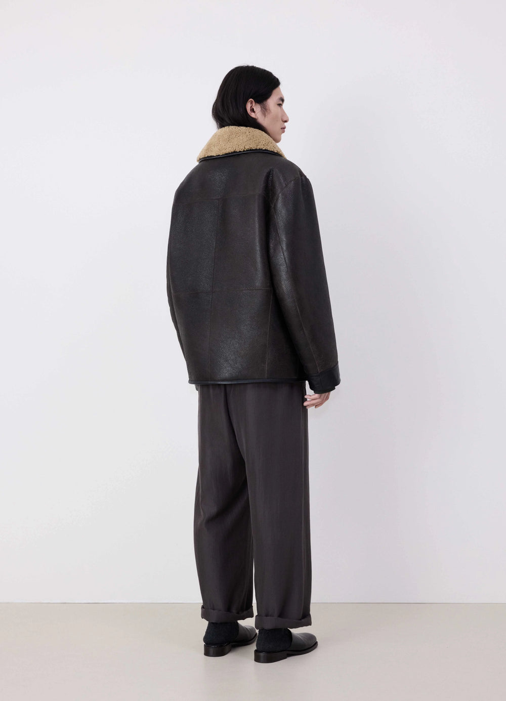 Lemaire Shearling Coat in Heavy Lamb Shearling, model shot, back view loose fit