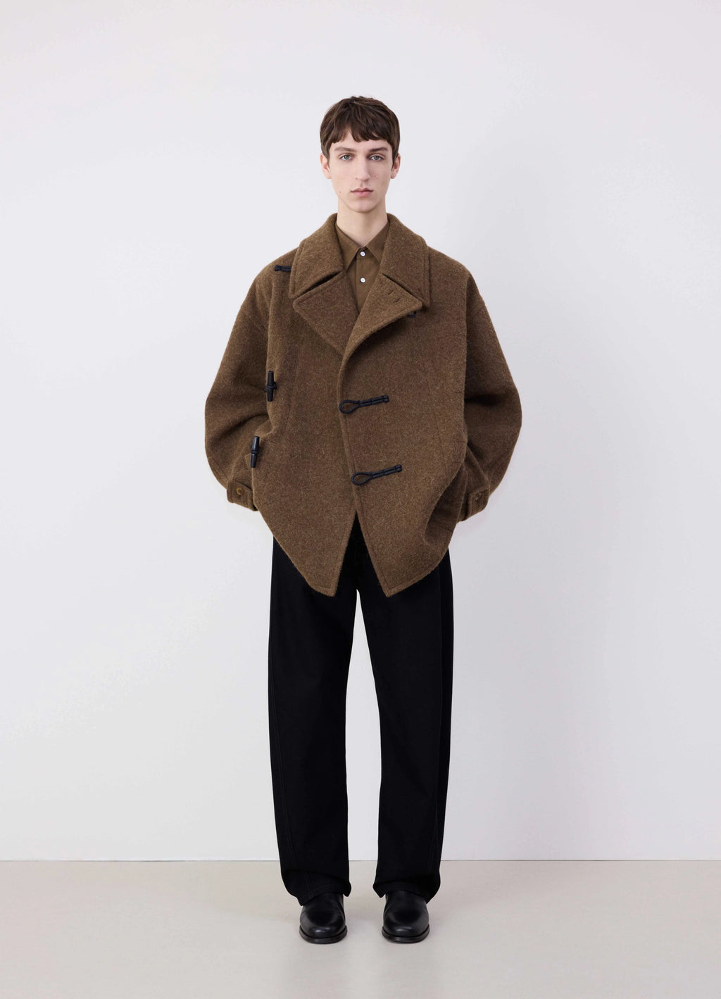 Lemaire Short Duffle Coat in Brown Wool Alpaca Mix, model shot, Front view Boxy silhouette worn open