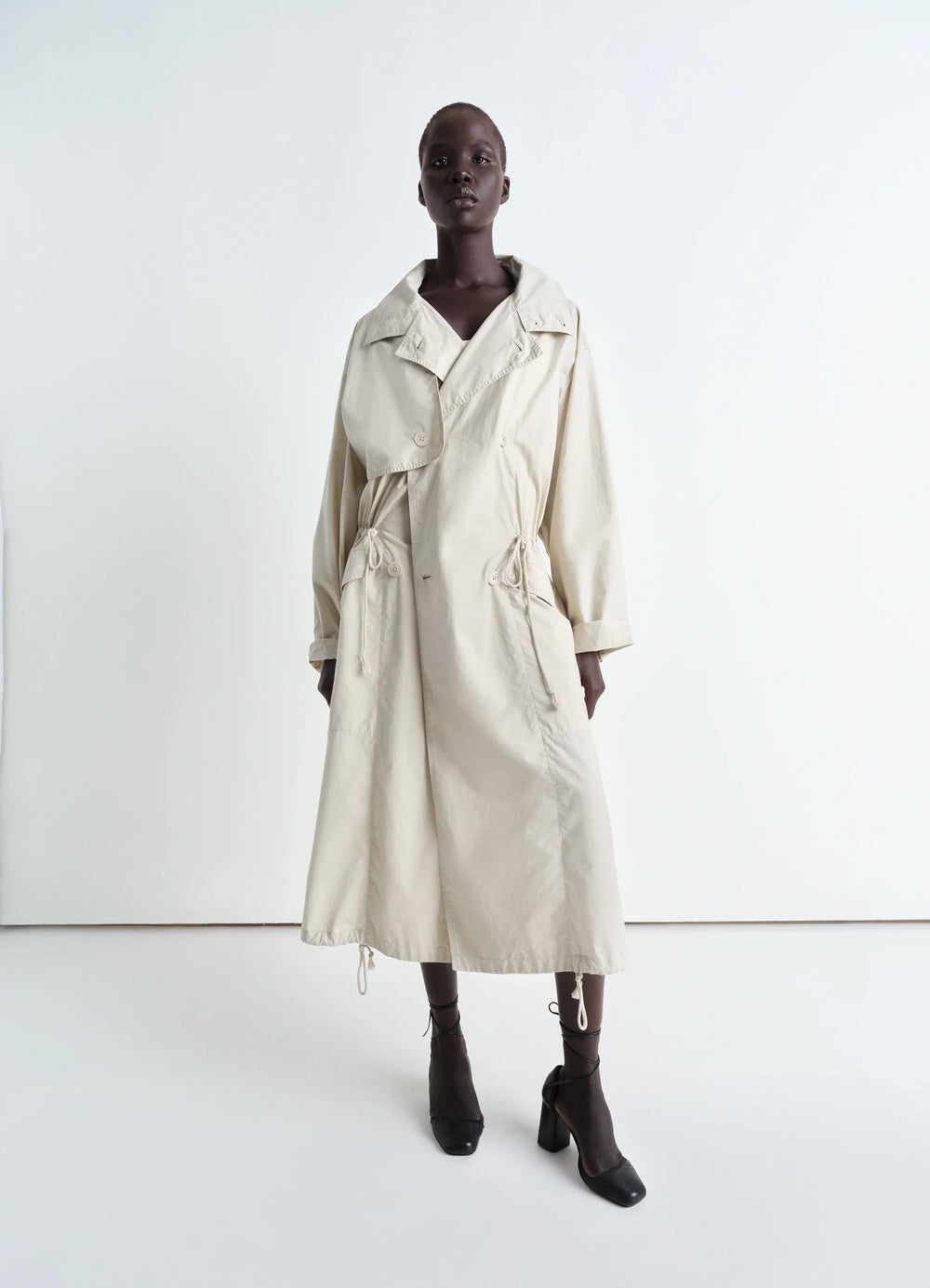 Unisex Parka in Lightweight VENTILE® cotton, model shot, full body side view cord channel waist, adjustable cuff