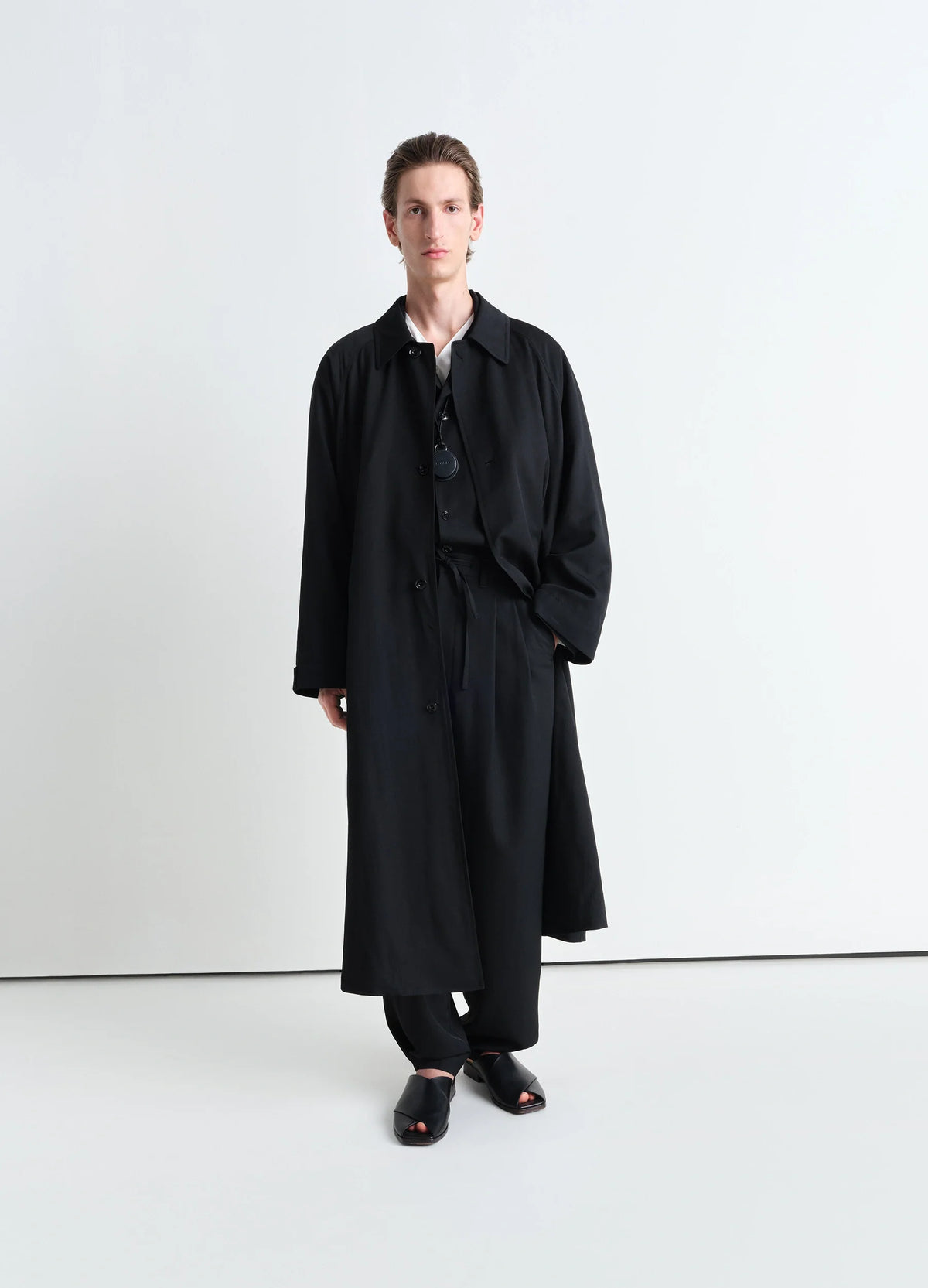 Half Overcoat in Black Wool Viscose Gabardine, model shot, Front view Oversized classic trench