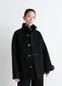 Lemaire Short Duffle Coat in Black Double-Faced Wool, model shot, Front view Wide cut with shiny piping