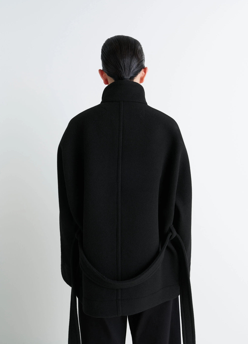 Lemaire Short Duffle Coat in Black Double-faced Wool, model shot, back view straight back seam