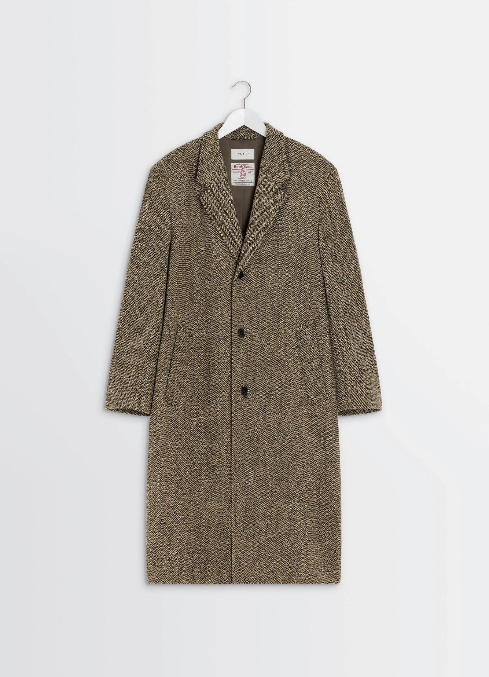 Chesterfield coat in herringbone harris tweed, product shot, hanger frontal view long sleeves visible