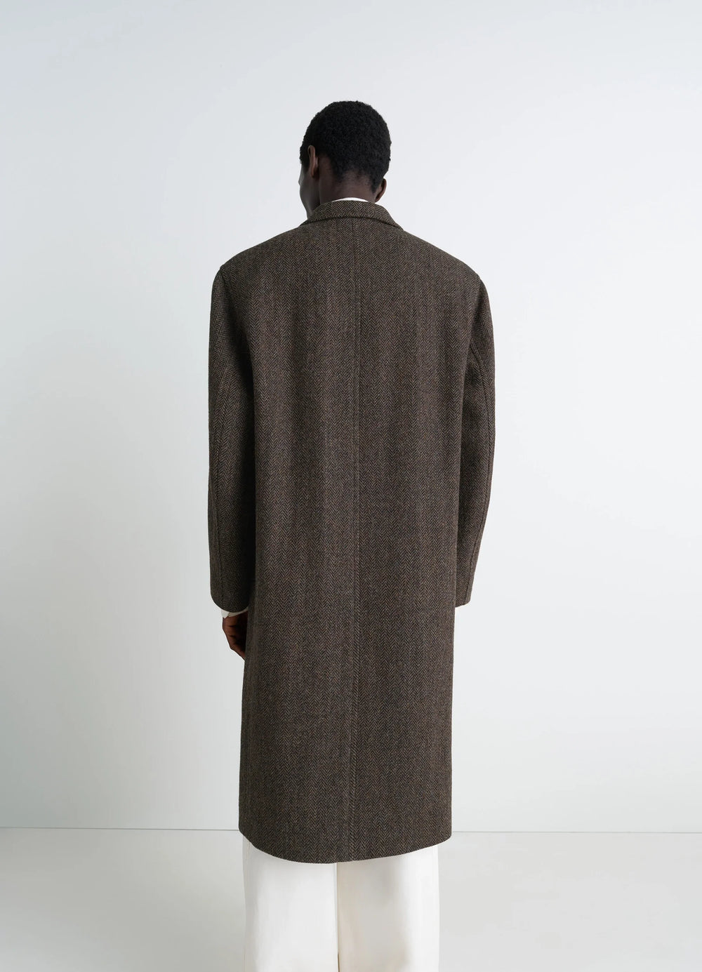Chesterfield Coat in Harris Tweed Herringbone, model shot, back view long draped style