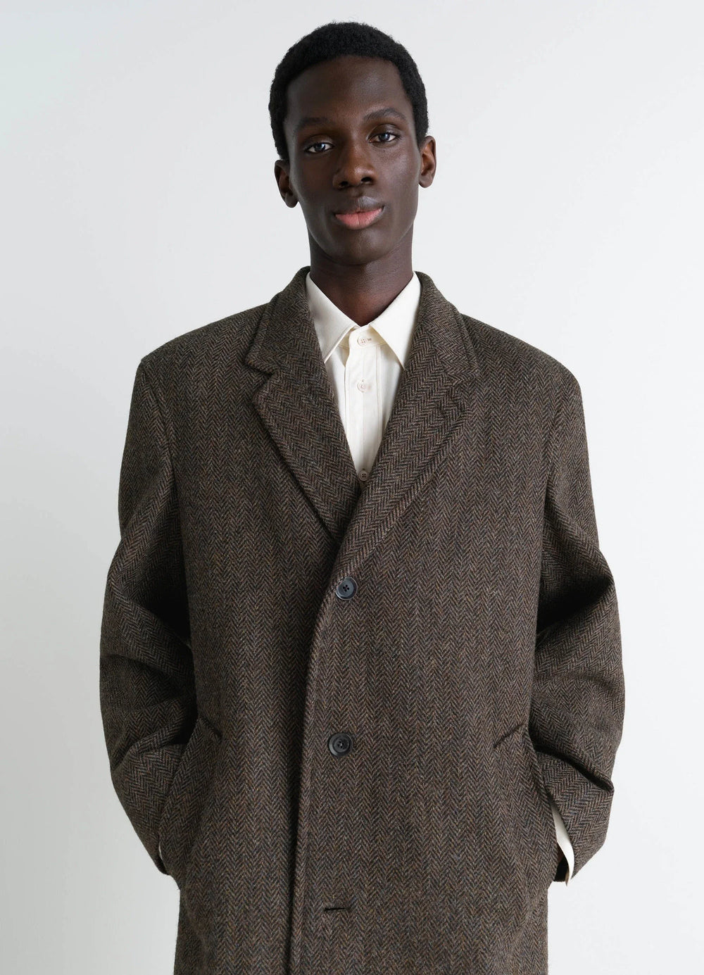 Chesterfield Coat in Harris Tweed Herringbone, model shot, upper body view oversized fit