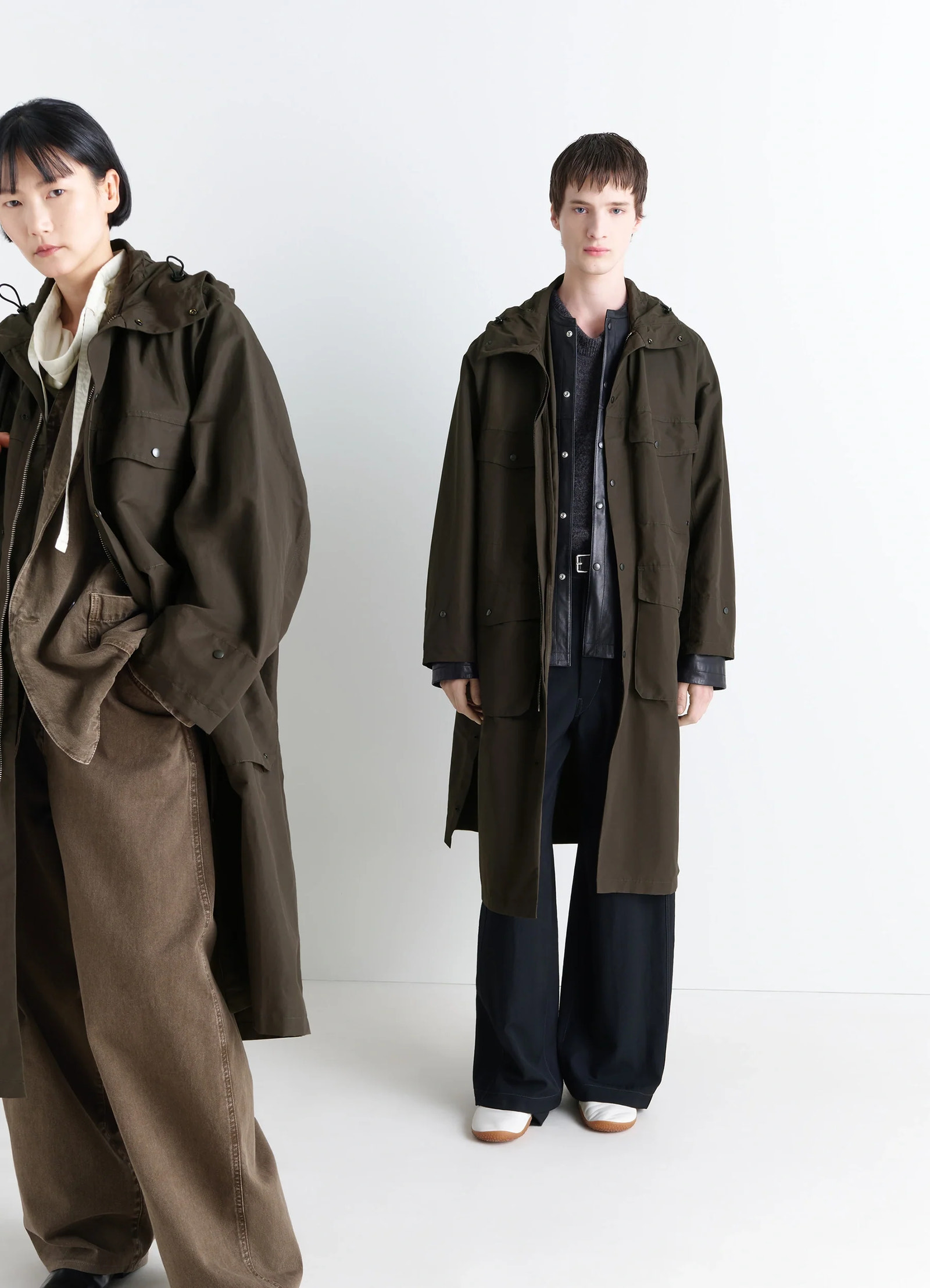 Lemaire utility raincoat in khaki linen cotton blend, model shot, front and side view long, unisex fit