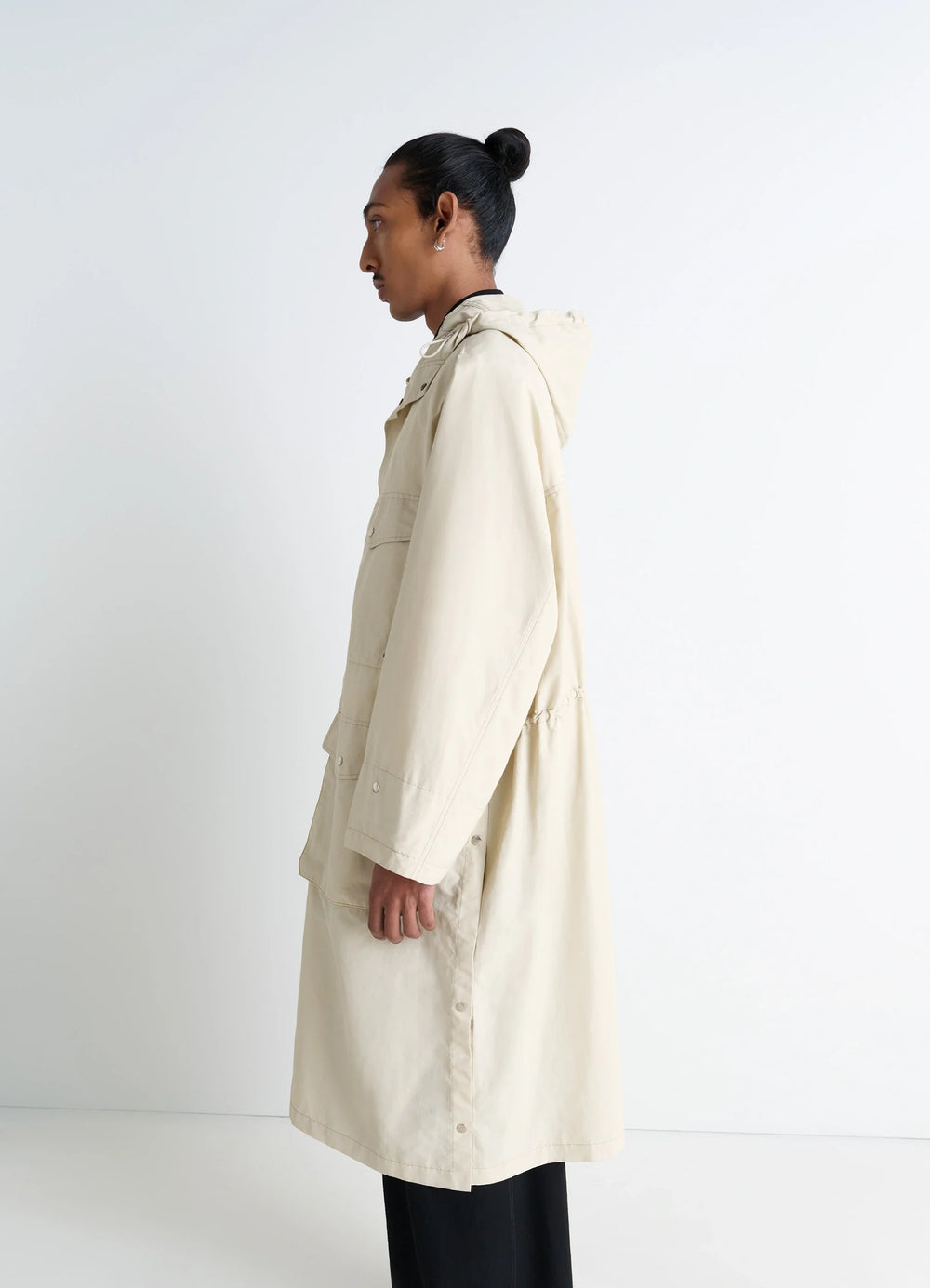 Lemaire Utility Raincoat in Beige Linen Cotton Blend, model shot, side view waist drawstring detail