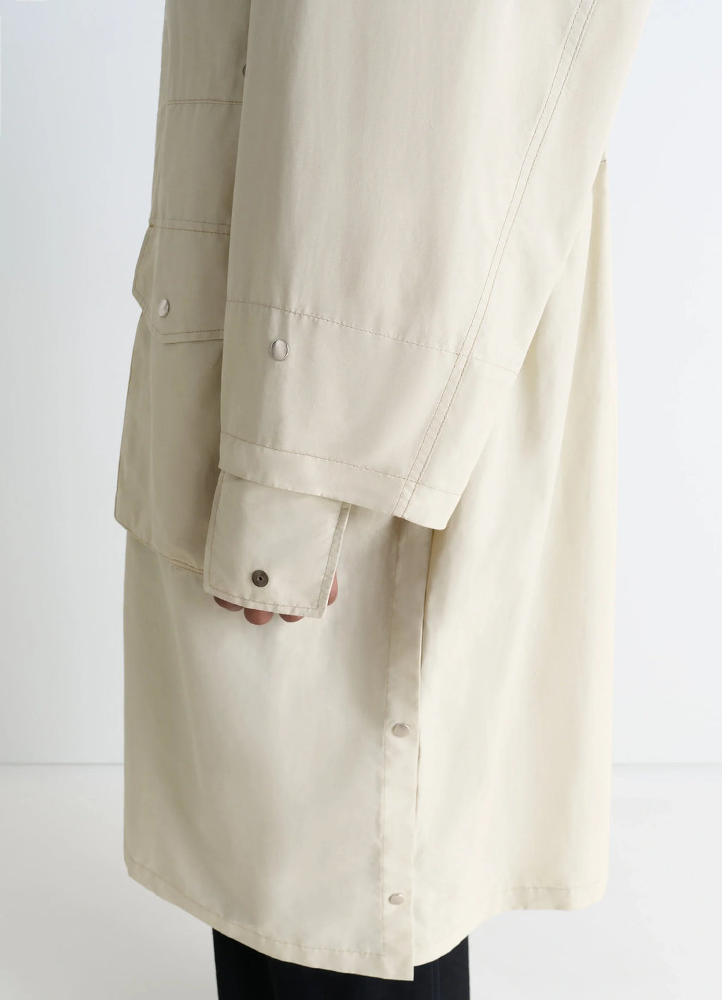 Lemaire Utility Raincoat in Beige Linen Cotton Blend, product shot, sleeve close-up buttoned sleeve cuff