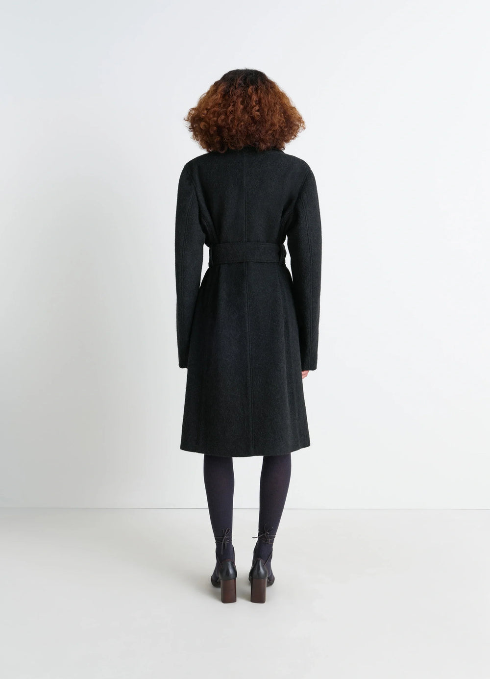 Belted Tailored Coat in Deep Charcoal Wool Alpaca, model shot, back view belted silhouette, straight back se